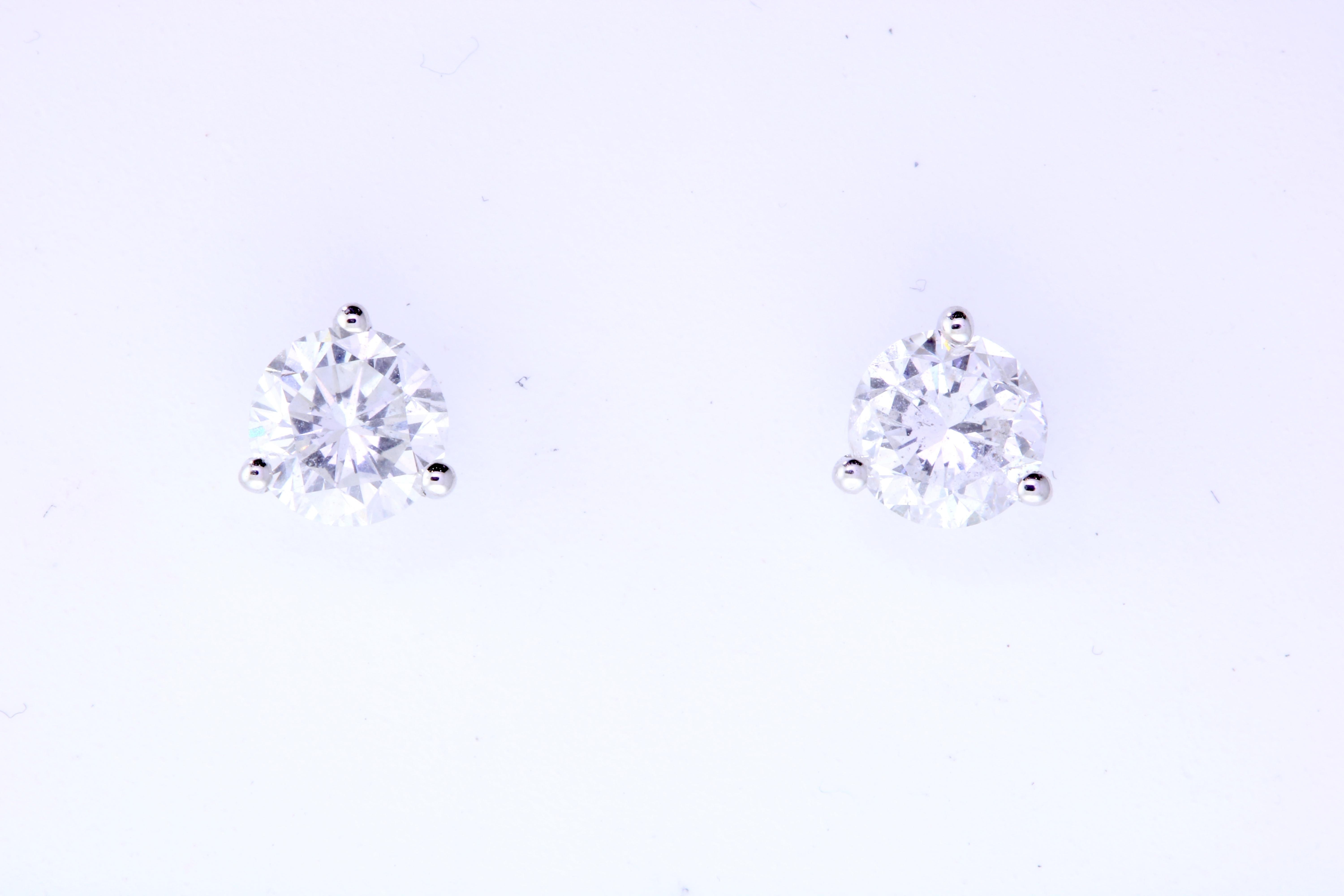 The most classic of all, you will shine with these Brilliant Round cut Diamond Earrings. At 1.05 Carats, we knew it was a match made in heaven when we found these prestige quality diamonds, matching so perfectly in quality and size. A staple piece