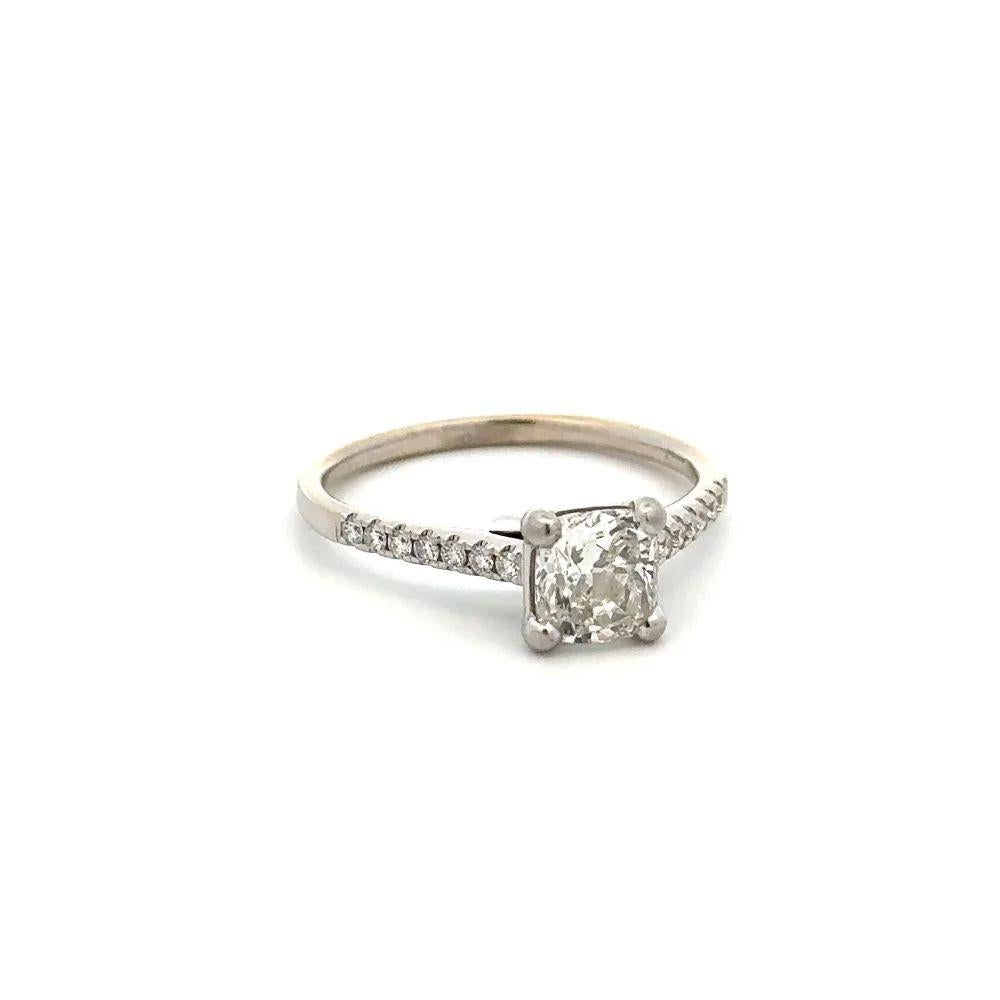 Simply Beautiful! Cushion Cut Diamond GIA Gold Solitaire Vintage Cocktail Ring. Centering a securely nestled Hand set Cushion Cut Brilliant Diamond, weighing approx. 1.05 Carat, H-SI2 GIA. Enhanced either side by Round Brilliant Cut Diamonds,