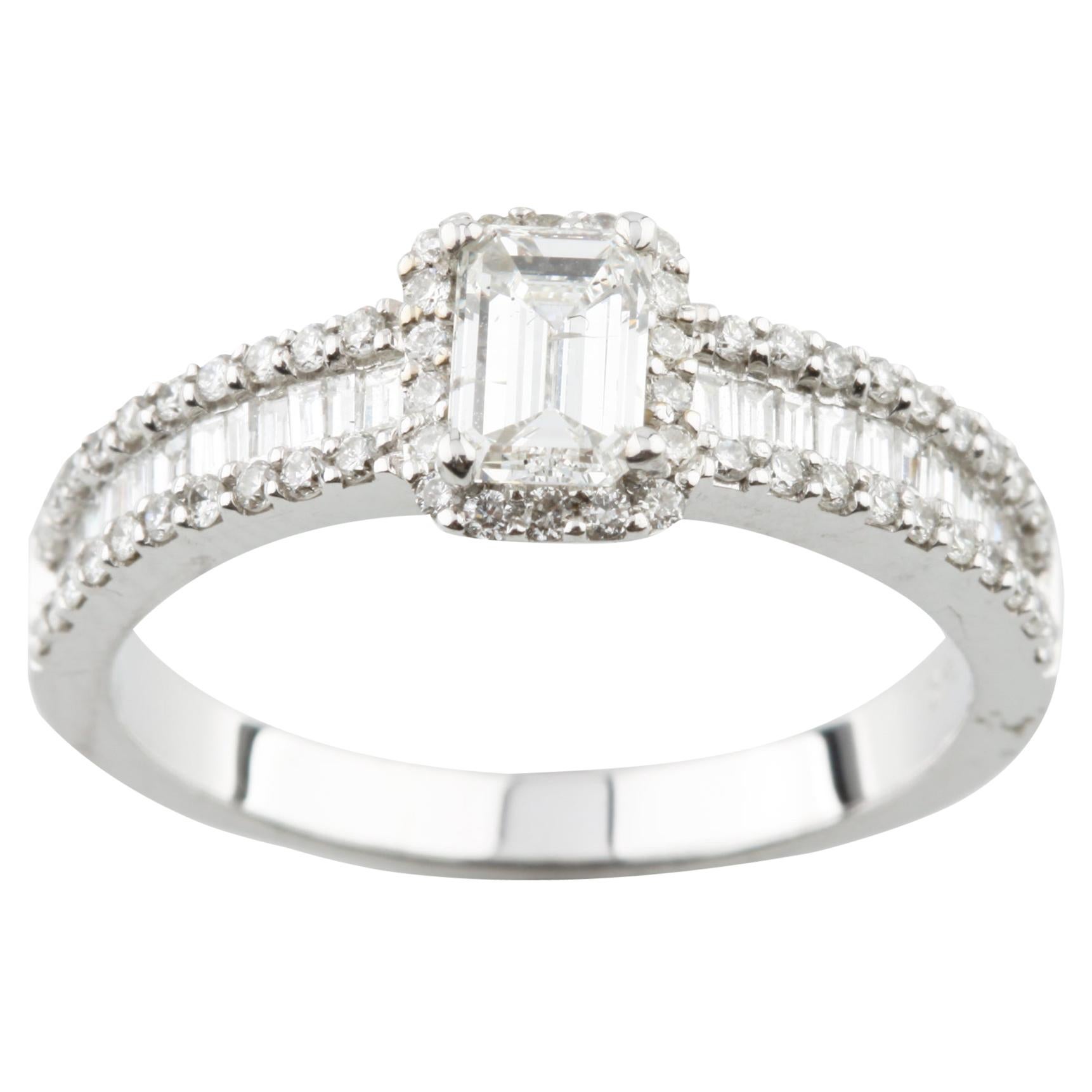 1.05 Carat Emerald Cut Diamond Engagement Ring Set in 14 Karat White Gold For Sale