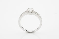 1.05 Carat Emerald Cut Diamond Engagement Ring Set in 14 Karat White Gold