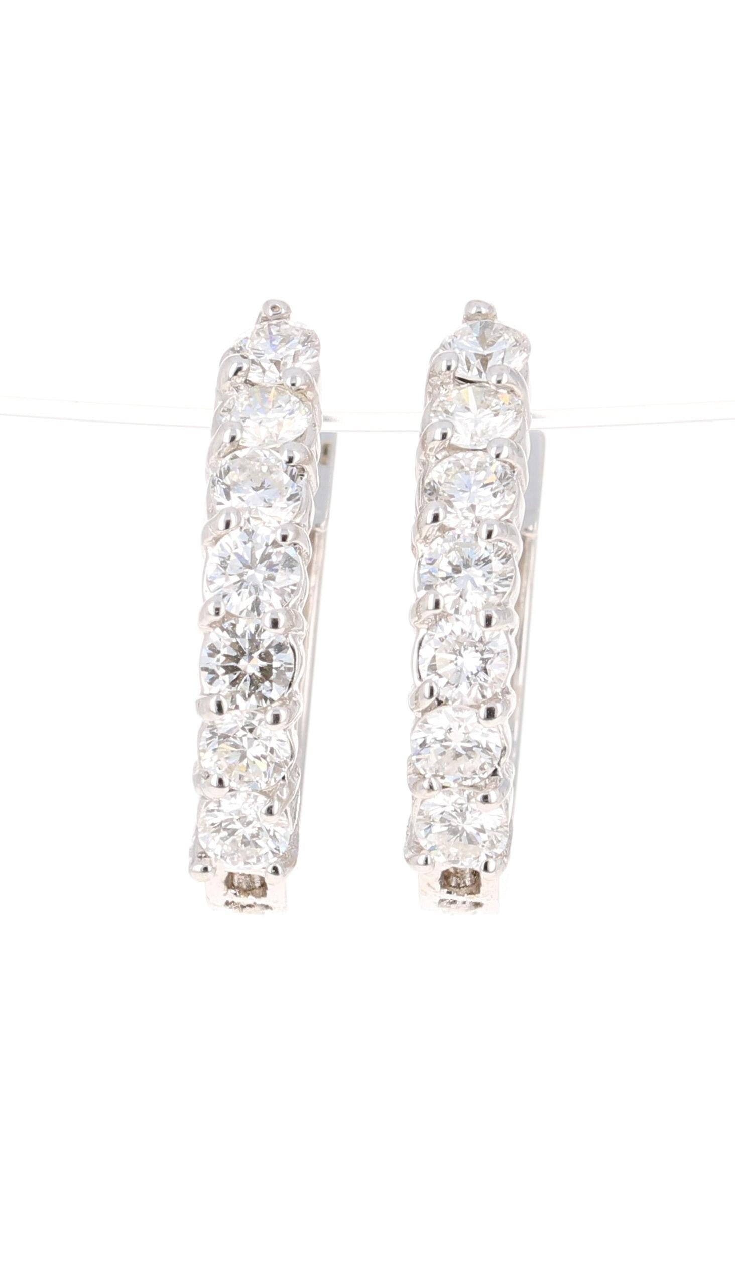 These versatile beauties are great every day earrings or special event earrings! 

14 Round Cut Diamonds that weigh 1.05 Carats are beautifully set on 18 Karat White Gold with an approximate gold weight of 4.1 grams. 

(Clarity: SI, Color: F)