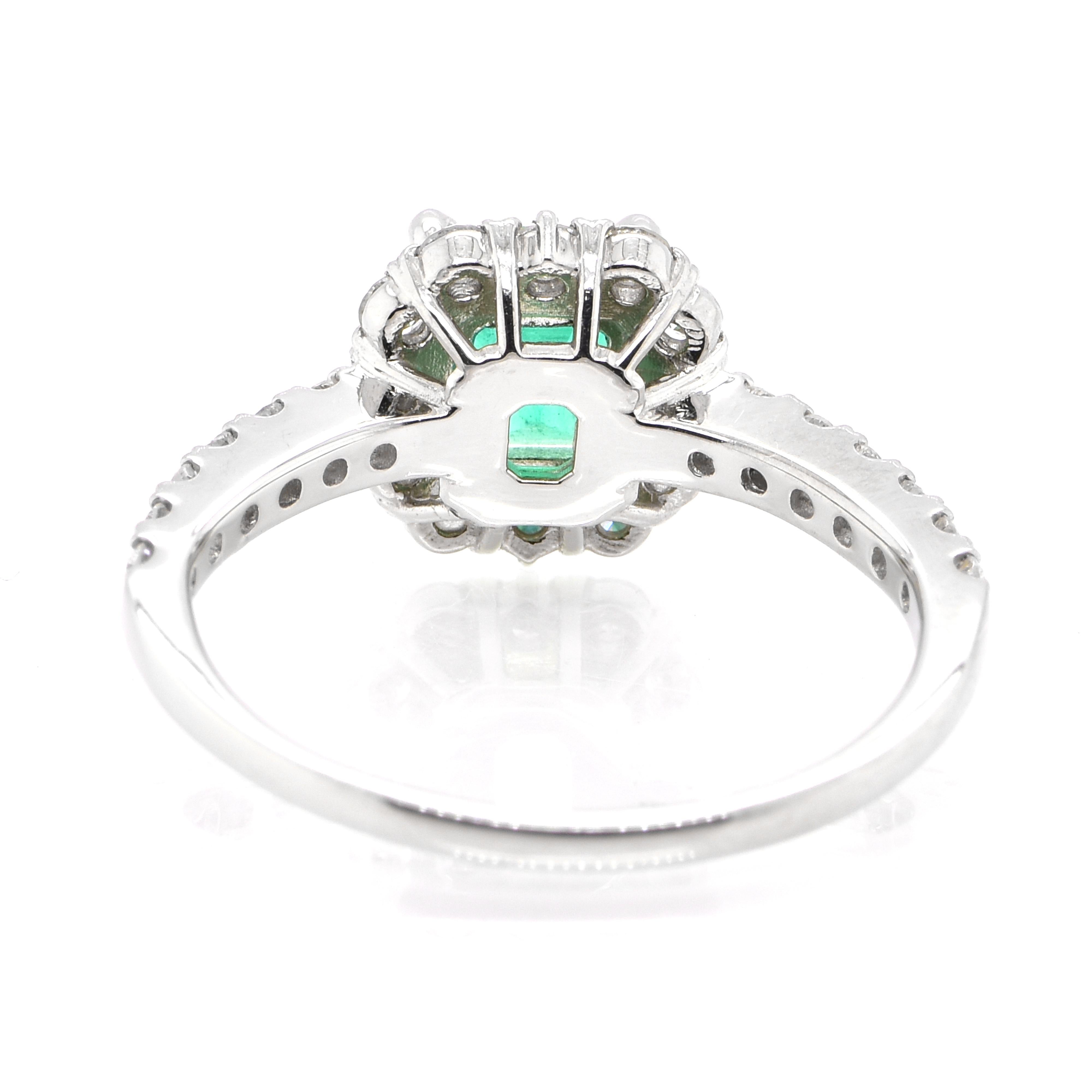 Women's 1.05 Carat Natural Colombian Emerald and Diamond Halo Ring set in Platinum For Sale