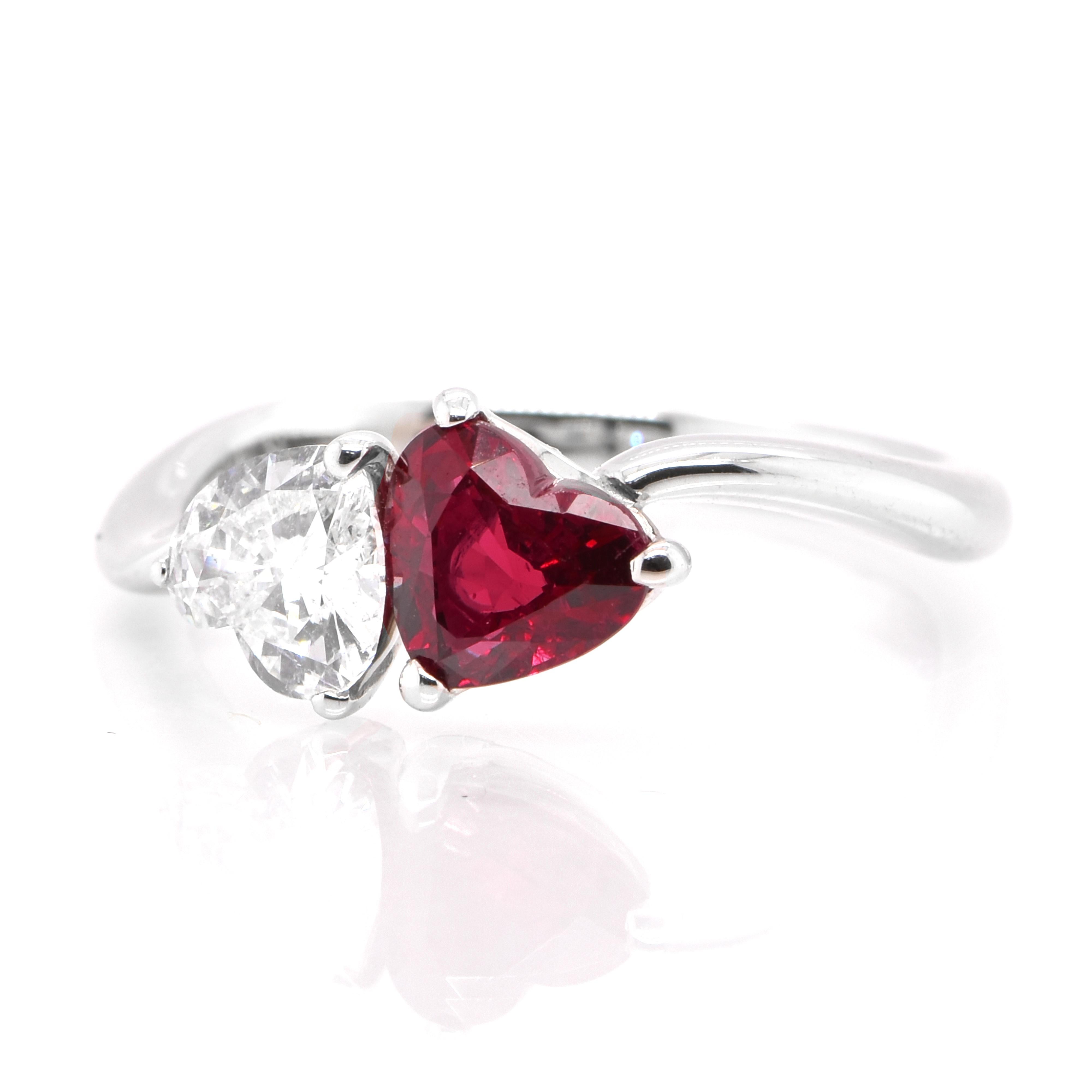 A beautiful Engagement ring set in Platinum featuring a 1.05 Carat Natural Ruby and 0.55 Carat Diamond. Rubies are referred to as 