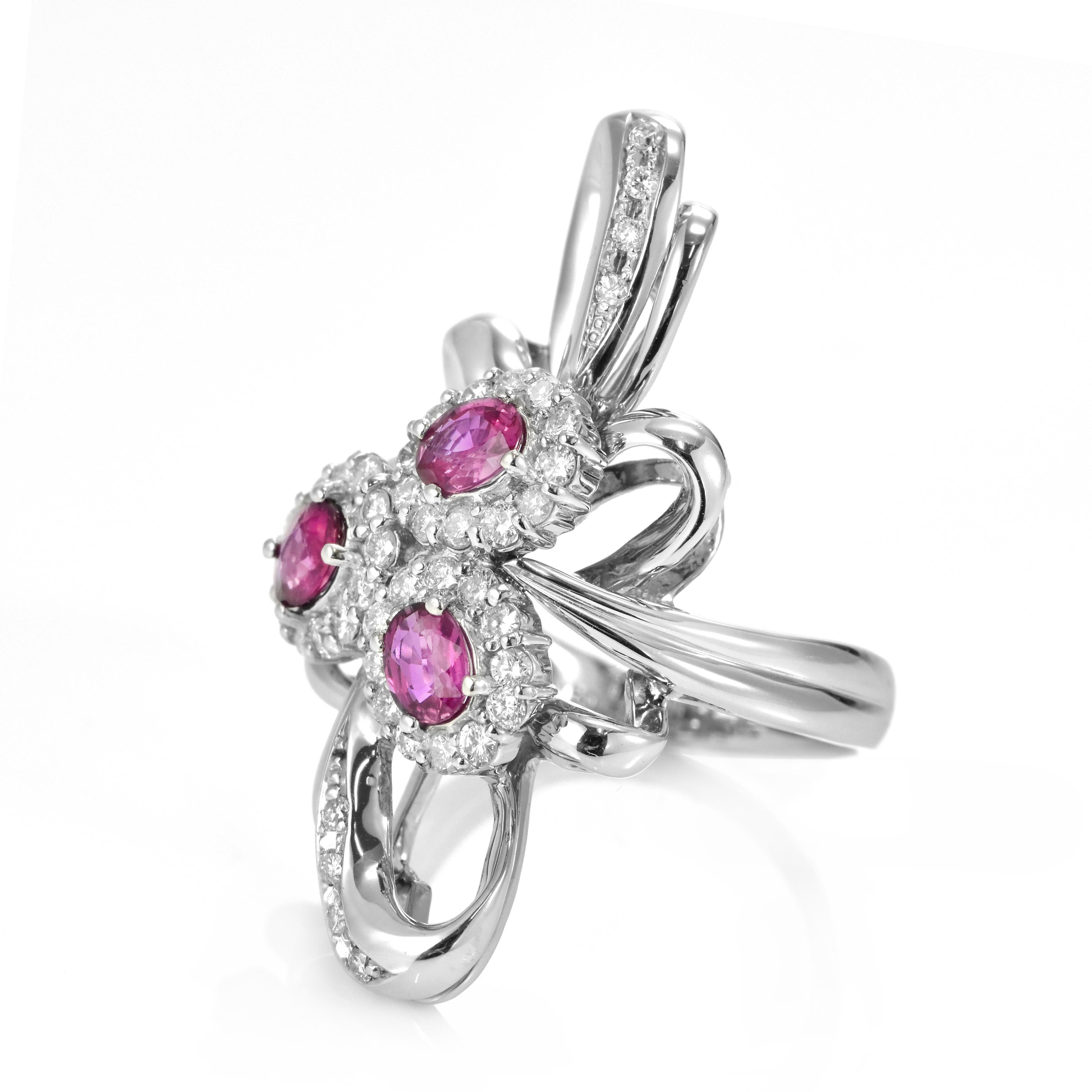 Oval Cut 1.05 Carat Natural Unheated Rubies and Diamond Cocktail Ring made in Platinum For Sale