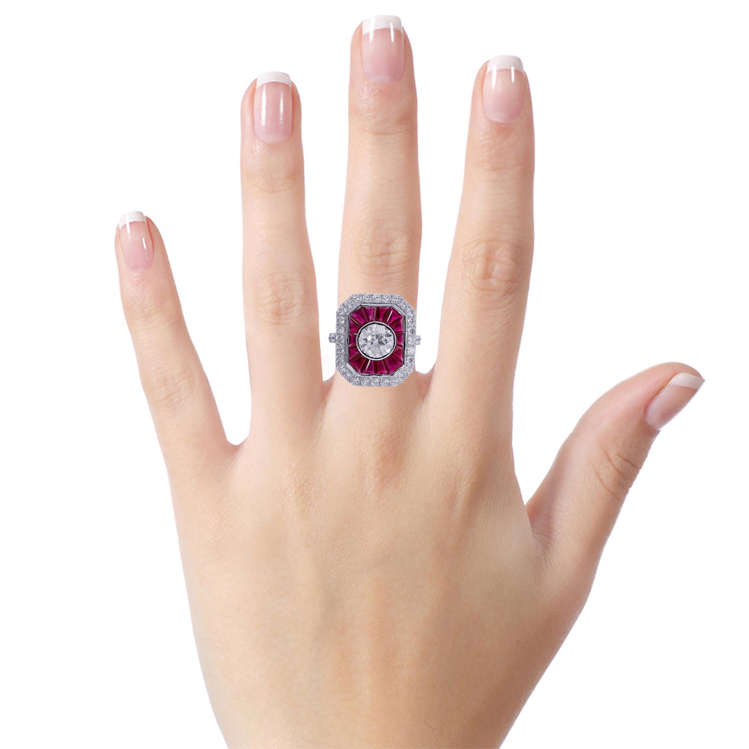 1.05 Carat Old European Cut Diamond with Ruby Statement Ring in 18 Karat Gold

This articulate contemporary old mutual/European cut diamond solitaire and unusual cut pigeon blood ruby ring is a magnificent lively design. The diamond round solitaire