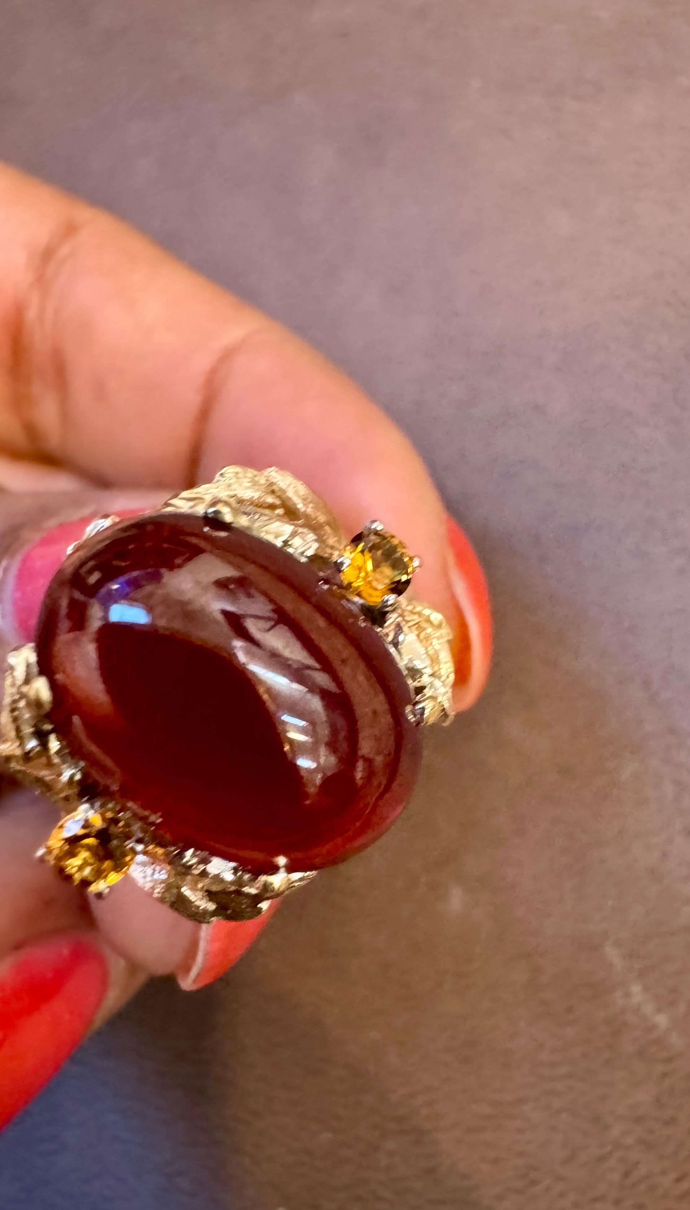 Bague cocktail vintage en or jaune 14 carats avec grenat ovale cabochon de 10,5 carats en vente 9