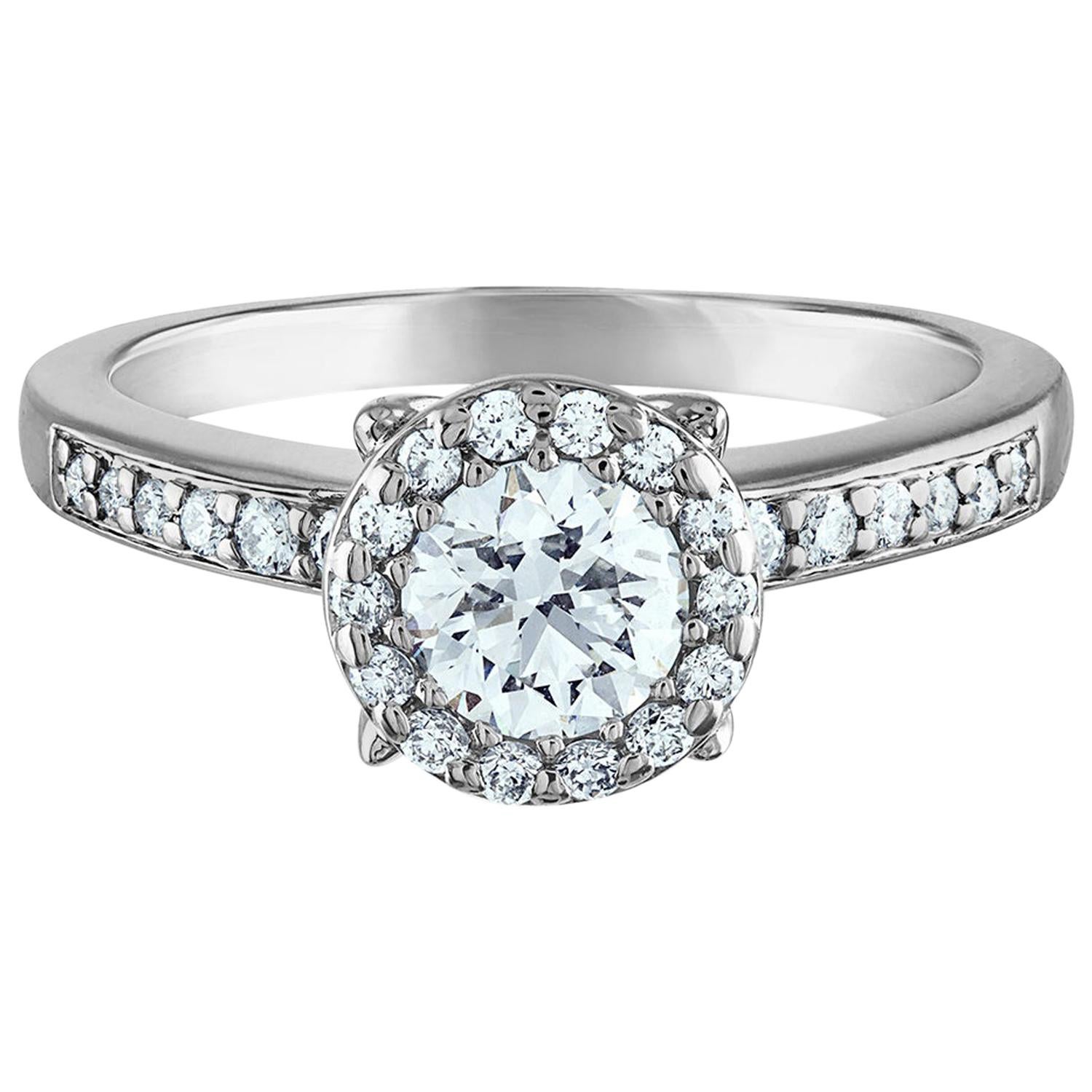 1.05 Carat Platinum Diamond Halo Engagement Ring, .70 Carat Diamond Center Stone For Sale