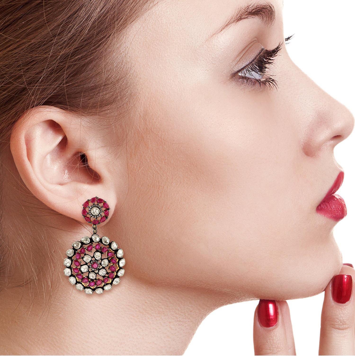 Handcrafted from 18-karat gold & sterling silver, these earrings are set with 10.5 carats of ruby and 7.5 carats diamonds with blackened finish.

FOLLOW  MEGHNA JEWELS storefront to view the latest collection & exclusive pieces.  Meghna Jewels is