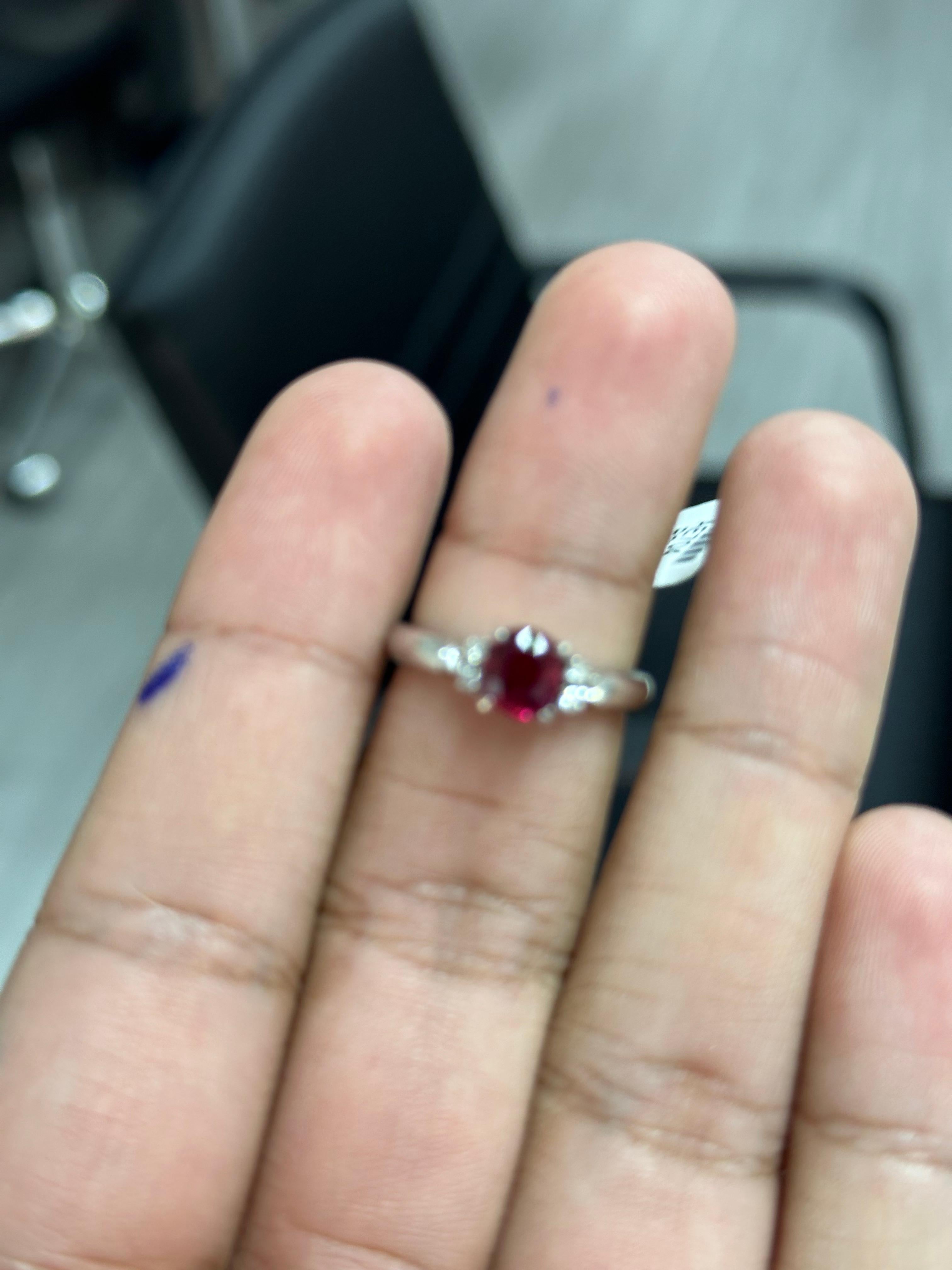 Indulge in the allure of exquisite jewelry with this captivating Ruby ring, a treasure that will leave all ruby lovers delighted. 

This magnificent ring showcases a breathtaking centerpiece—a 1.05  Carat oval-cut Ruby, radiating an opulent, pigeon