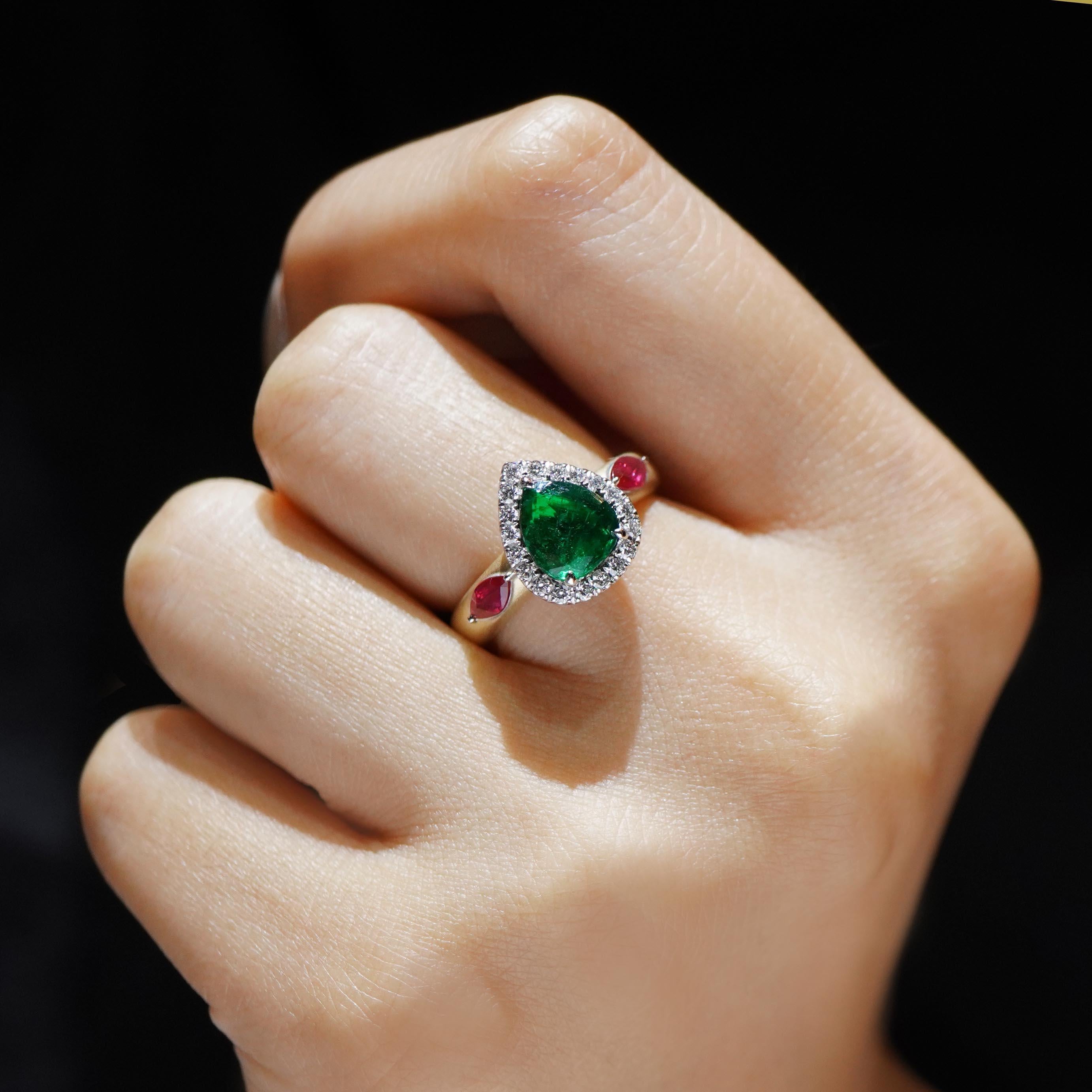 Women's 1.05 Carat Vivid Green Emerald Flanked by Ruby Marquise Matt Finish 18K Gold For Sale