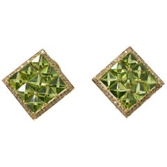1.05 Carat White Round Brilliant Diamond And 19.26 Carat Peridot Stud Earrings.