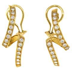 Boucles d'oreilles tourbillon en or jaune avec diamants de 1,05 carat