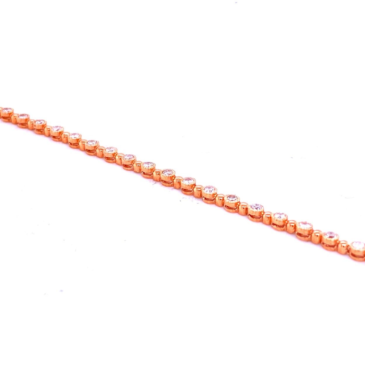 This Diamond Bracelet consists of 36 Links Bezel Set 1.8 mm Round Brilliant diamonds. The bracelet is made in 14K Gold with Milgrained edges for maximum brilliance.  The bracelet comes with a built in lock for safety.
Metal: 14K Rose Gold
Total