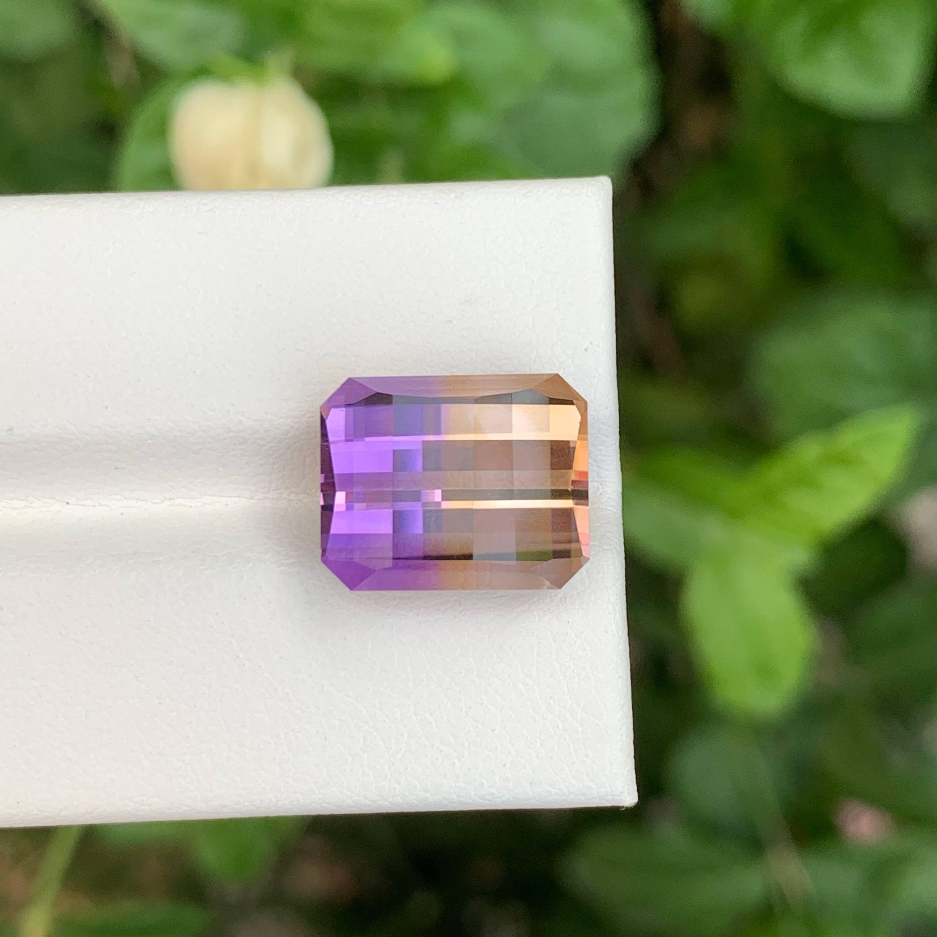 Weight 10.50 carat
Dimensions 14.2x11.5x9mm
Treatment None
Origin Brazil
Clarity Loupe Clean
Shape Cut Pixel
NA


This 10.50-carat natural Ametrine gemstone is a captivating fusion of golden Citrine and deep purple Amethyst, showcasing nature’s