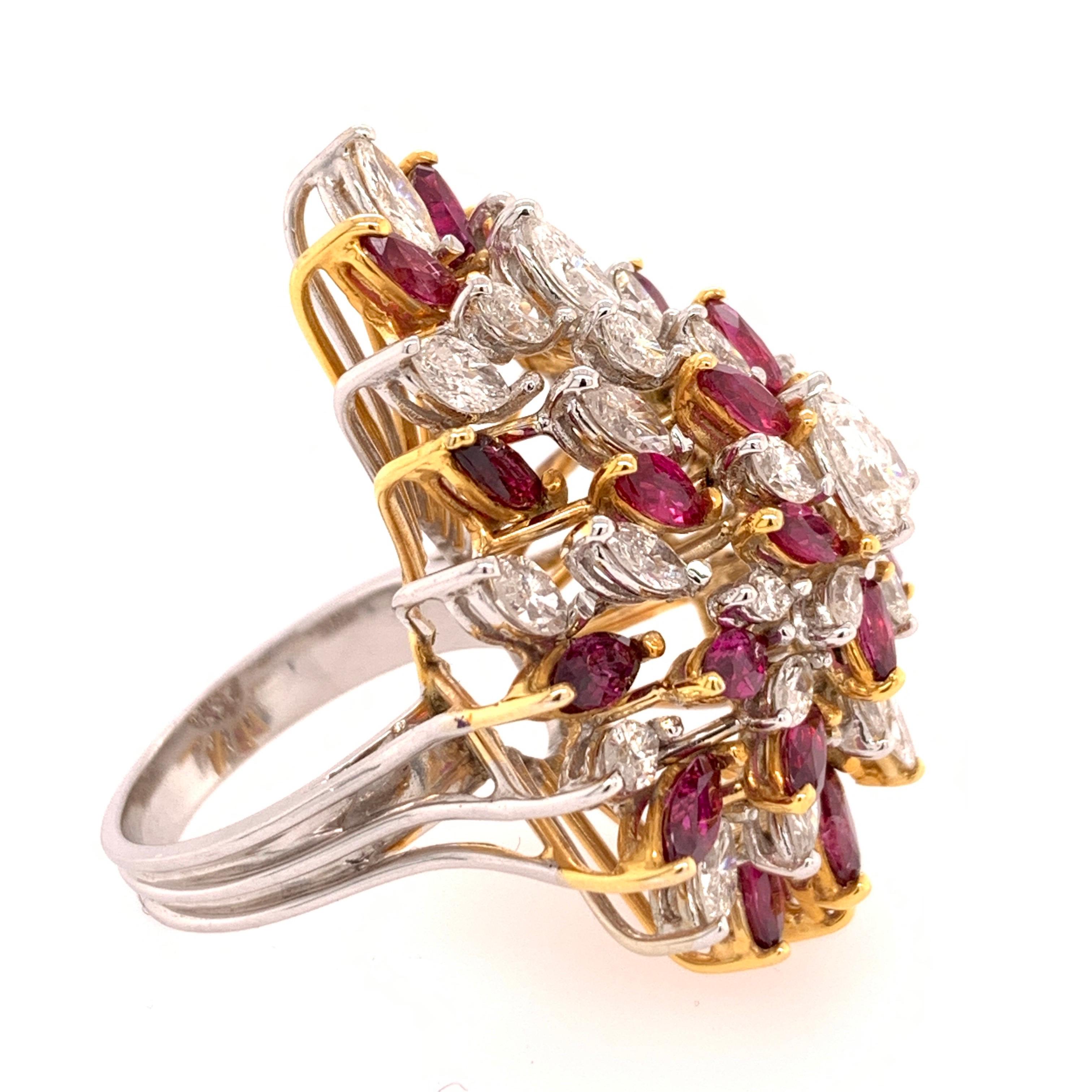 Magnificent Gold cocktail ring with a total NATURAL diamond weight of approximately 5.25cts (32 stones) and a total NATURAL ruby weight of approximately 5.25cts (24 stones).

The diamonds consist of 31 marquise shaped appx G-I color and si-vvs
