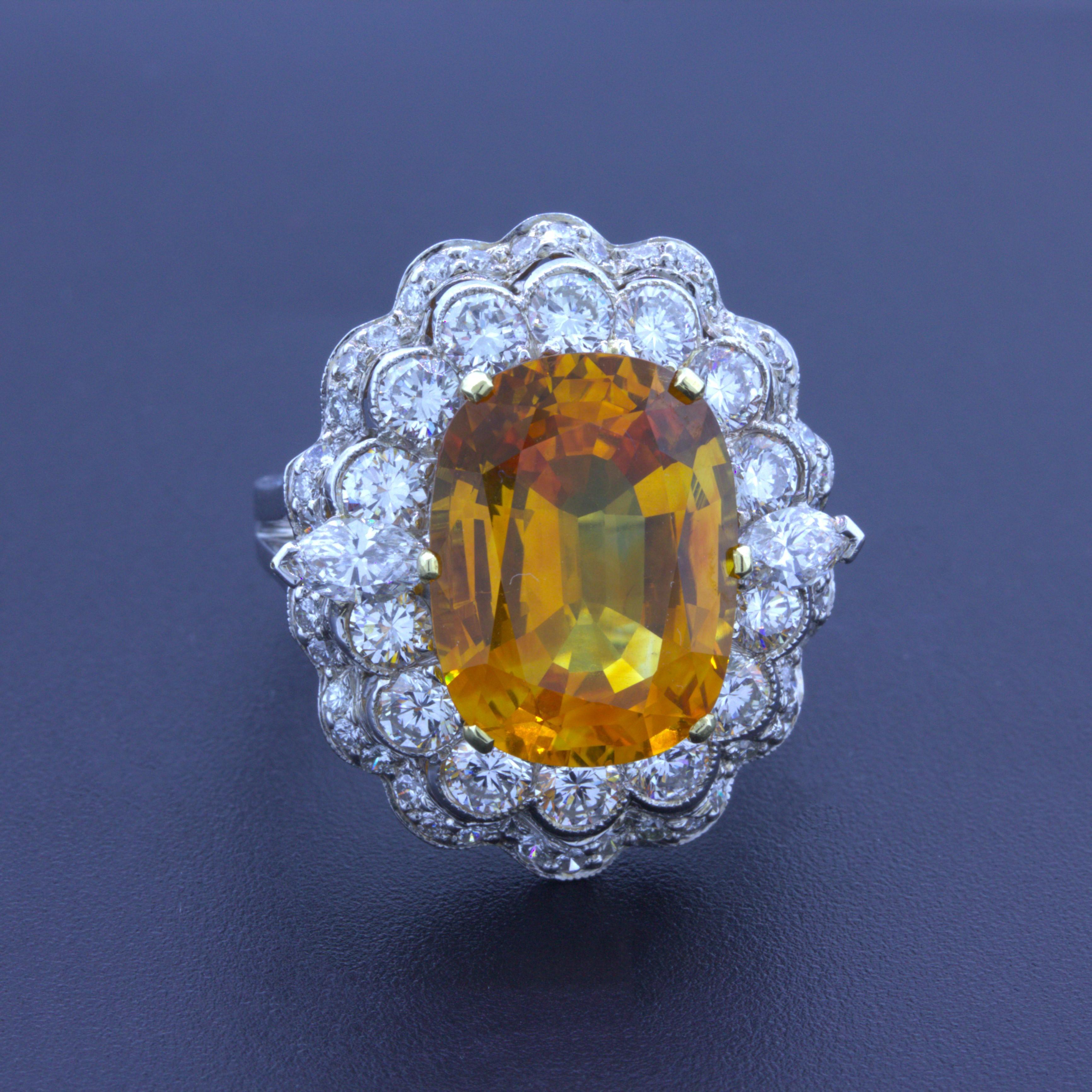 A large and impressive natural orange sapphire weighing 10.50 carats. It has a rich and brilliant orange color with excellent brightness. Additionally, it is extremely clean with no visible inclusions and certified by the GIA. It is complemented by