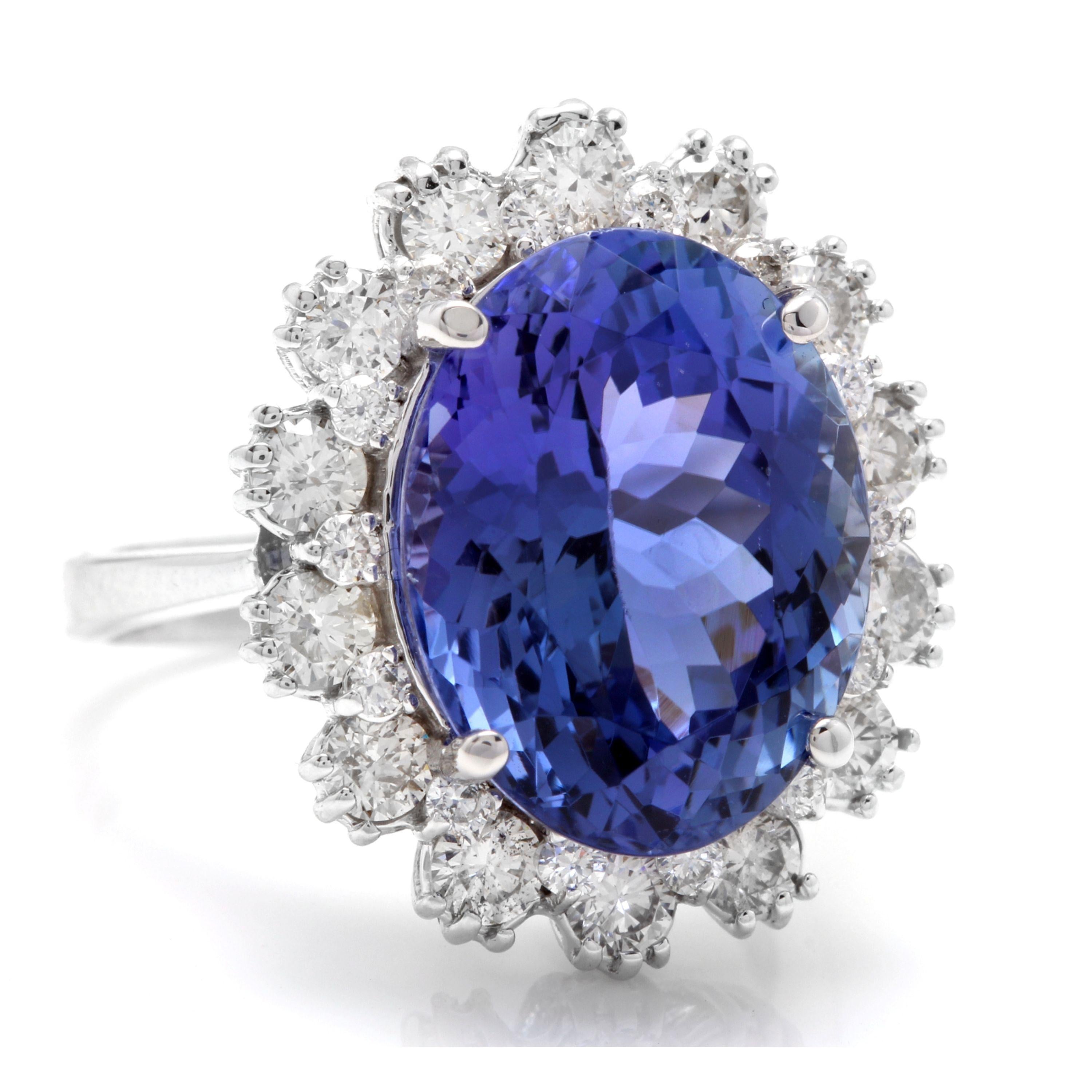 10.50 Carats Natural Very Nice Looking Tanzanite and Diamond 14K Solid White Gold Ring

Total Natural Oval Cut Tanzanite Weight is: Approx. 9.00 Carats

Tanzanite Measures: Approx. 13.00 x 11.00mm

Natural Round Diamonds Weight: Approx. 1.50 Carats