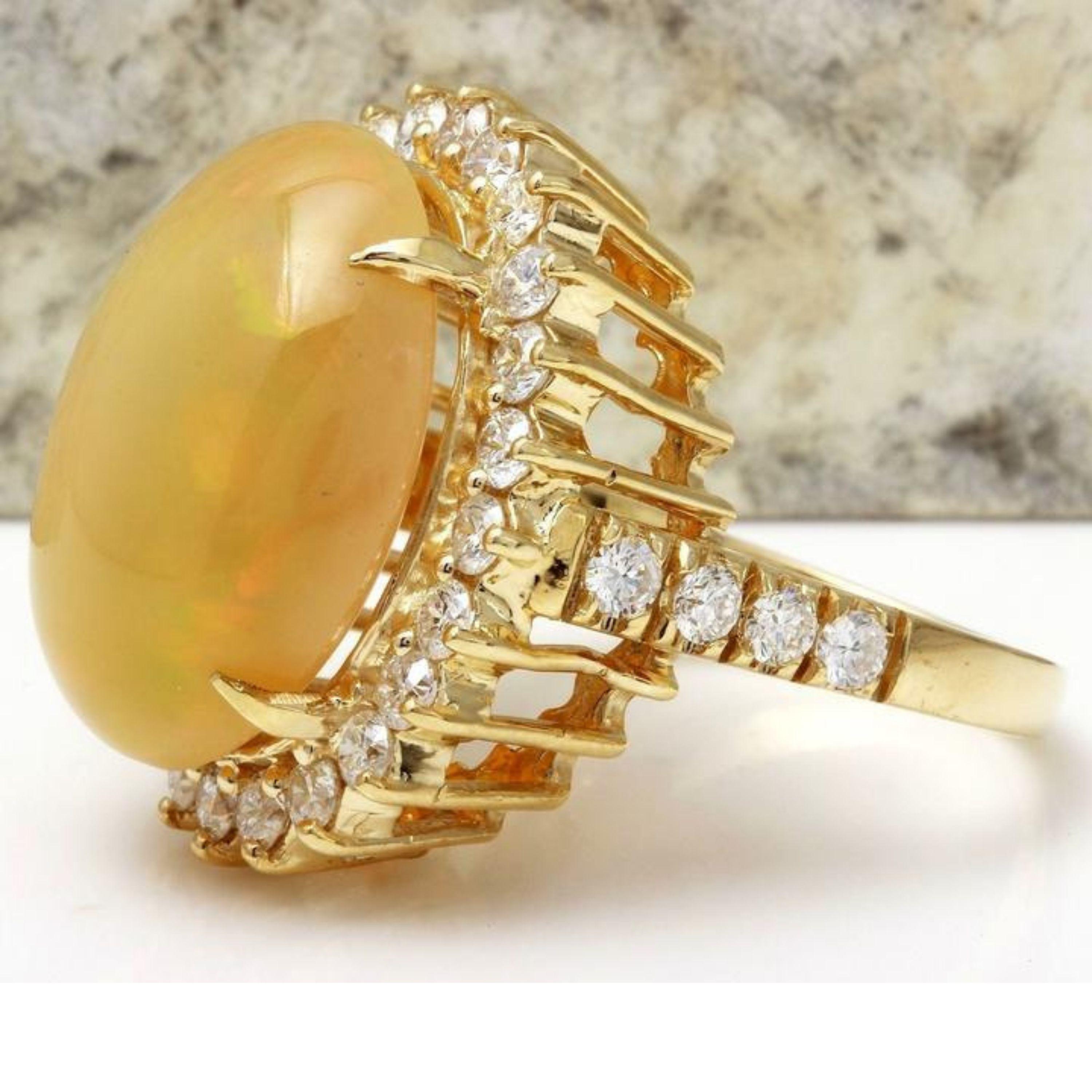 10.50 Carats Natural Impressive Ethiopian Opal and Diamond 14K Solid Yellow Gold Ring

Total Natural Opal Weight is: 8.50 Carats

Opal Measures: 13.48x 10.00mm

The head of the ring measures: 18.77 x 14.73mm

Total Natural Round Diamonds Weight: