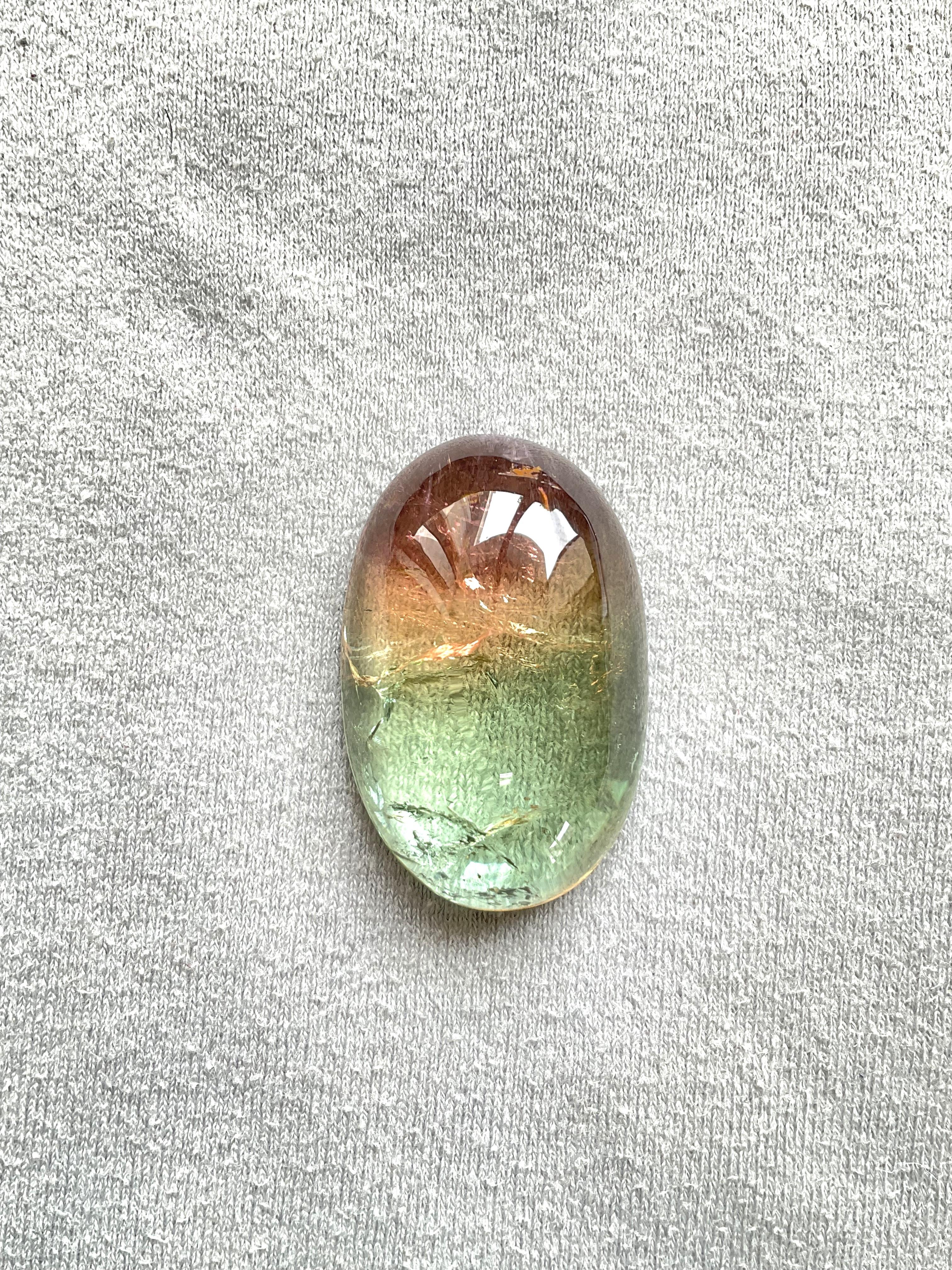 Art Deco 105.03 Carats Bi Color Tourmaline Oval cabochon very good quality color variety For Sale