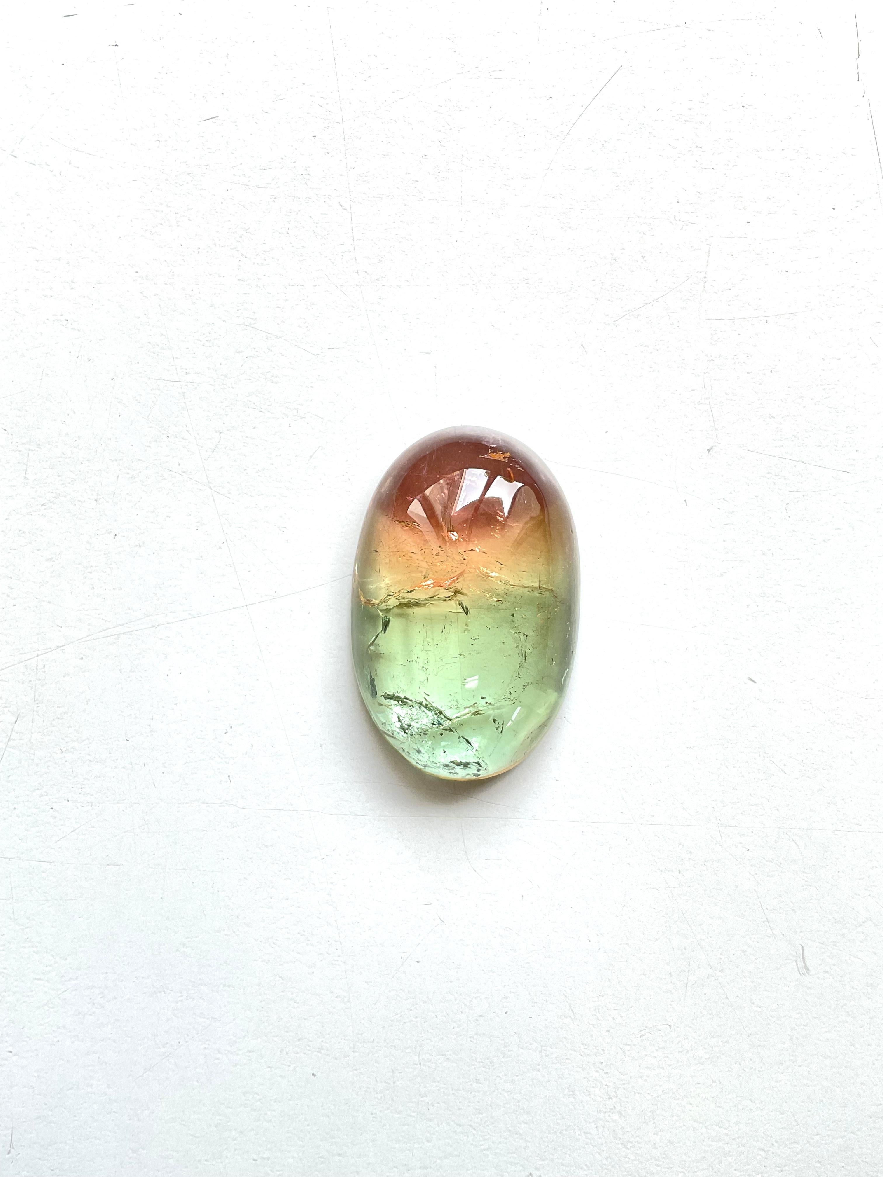 105.03 Carats Bi Color Tourmaline Oval cabochon very good quality color variety For Sale 1