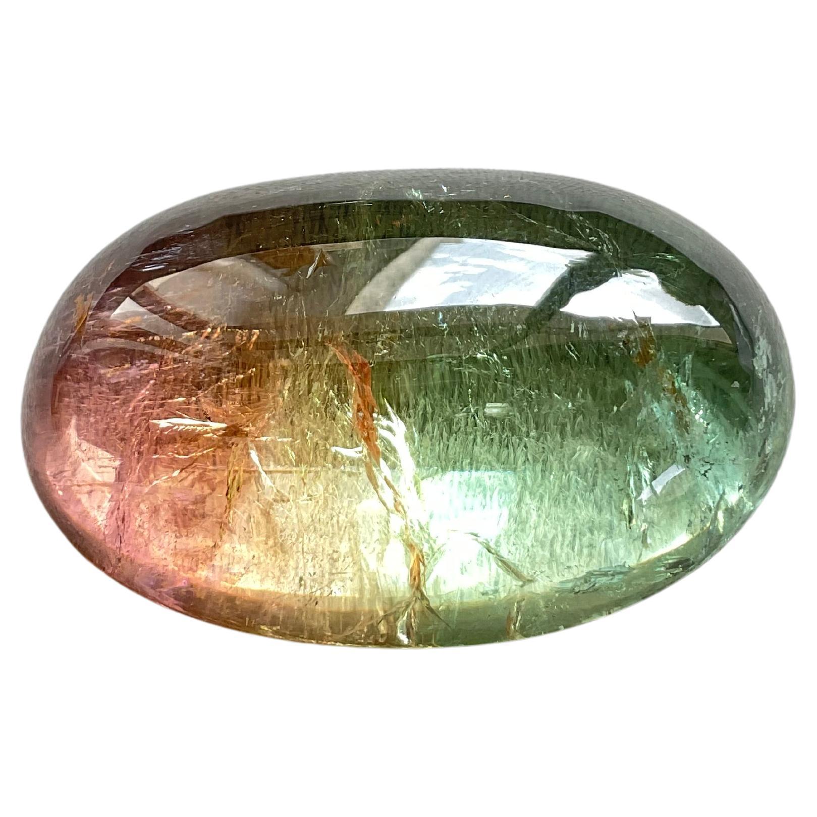105.03 Carats Bi Color Tourmaline Oval cabochon very good quality color variety For Sale
