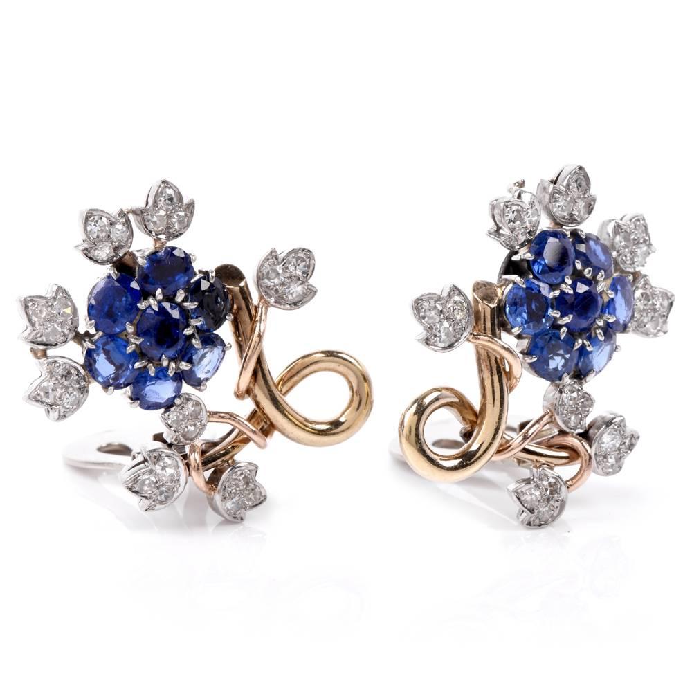 These aesthetically enchanting vintage earrings of notable feminine grace are crafted in a combination of 18 karat yellow, and white gold, weigh 17.3 grams and measure 28 mm x 24 mm. The These alluring vintage earrings incorporate a pair of blue