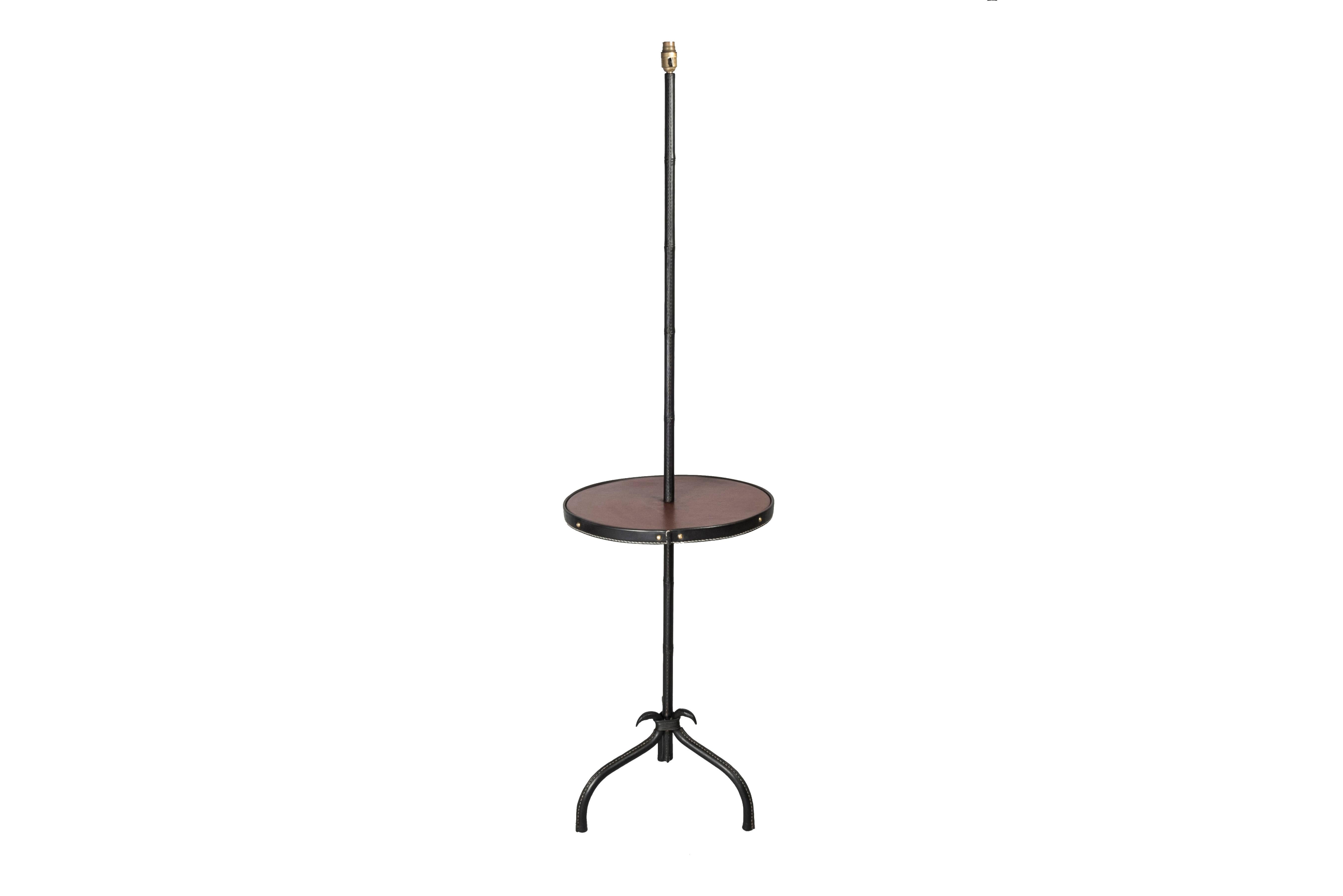 1950's Stitched leather floor lamp designed by Jacques Adnet
Black and chocolate brown leather 
Dimensions given without shade, no shade provided.