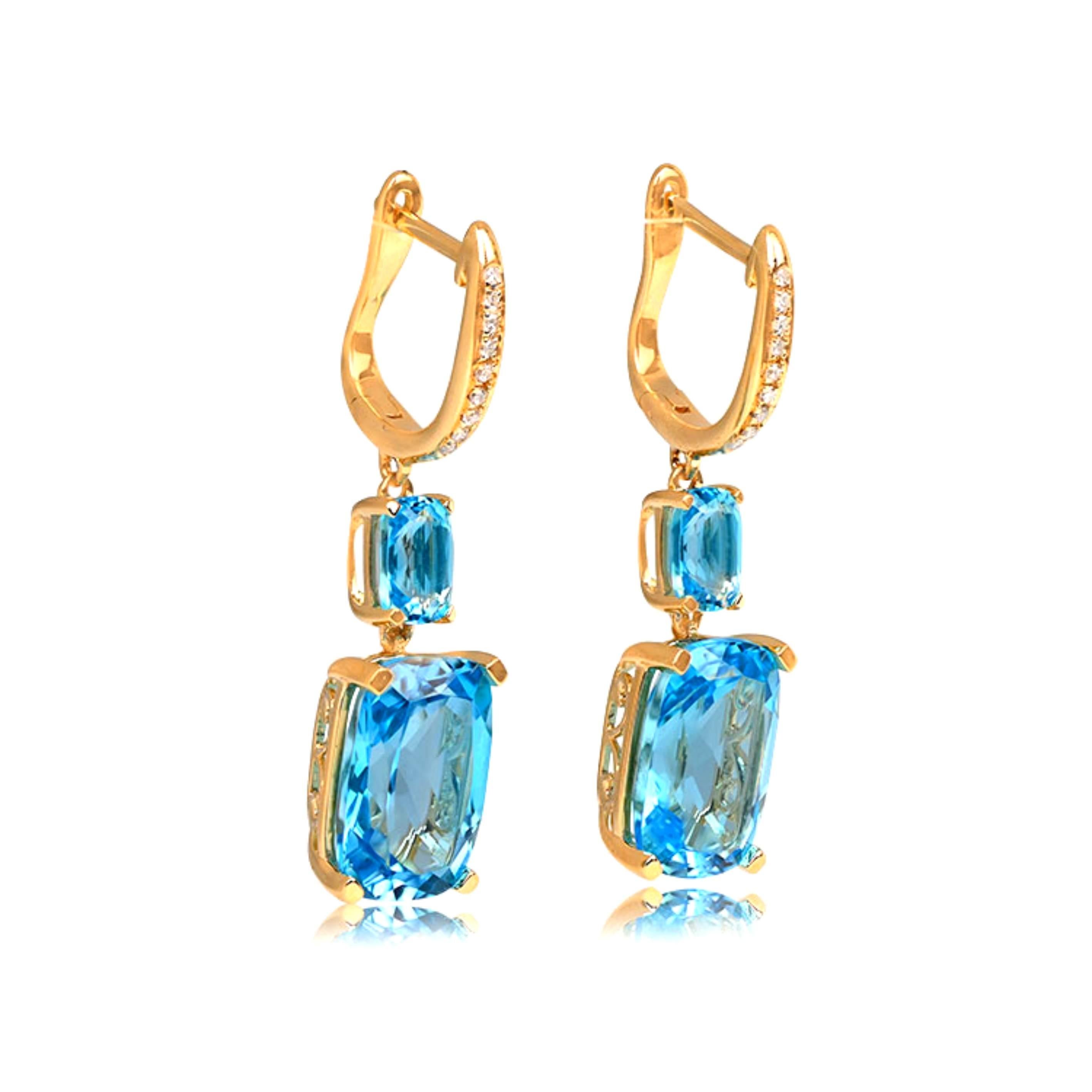 Elevate your style with the enchanting beauty of these 14k yellow gold drop earrings. Designed to captivate, they showcase cushion-cut natural blue topaz gemstones securely set in prongs. The total weight of the topaz is an impressive 10.51 carats,