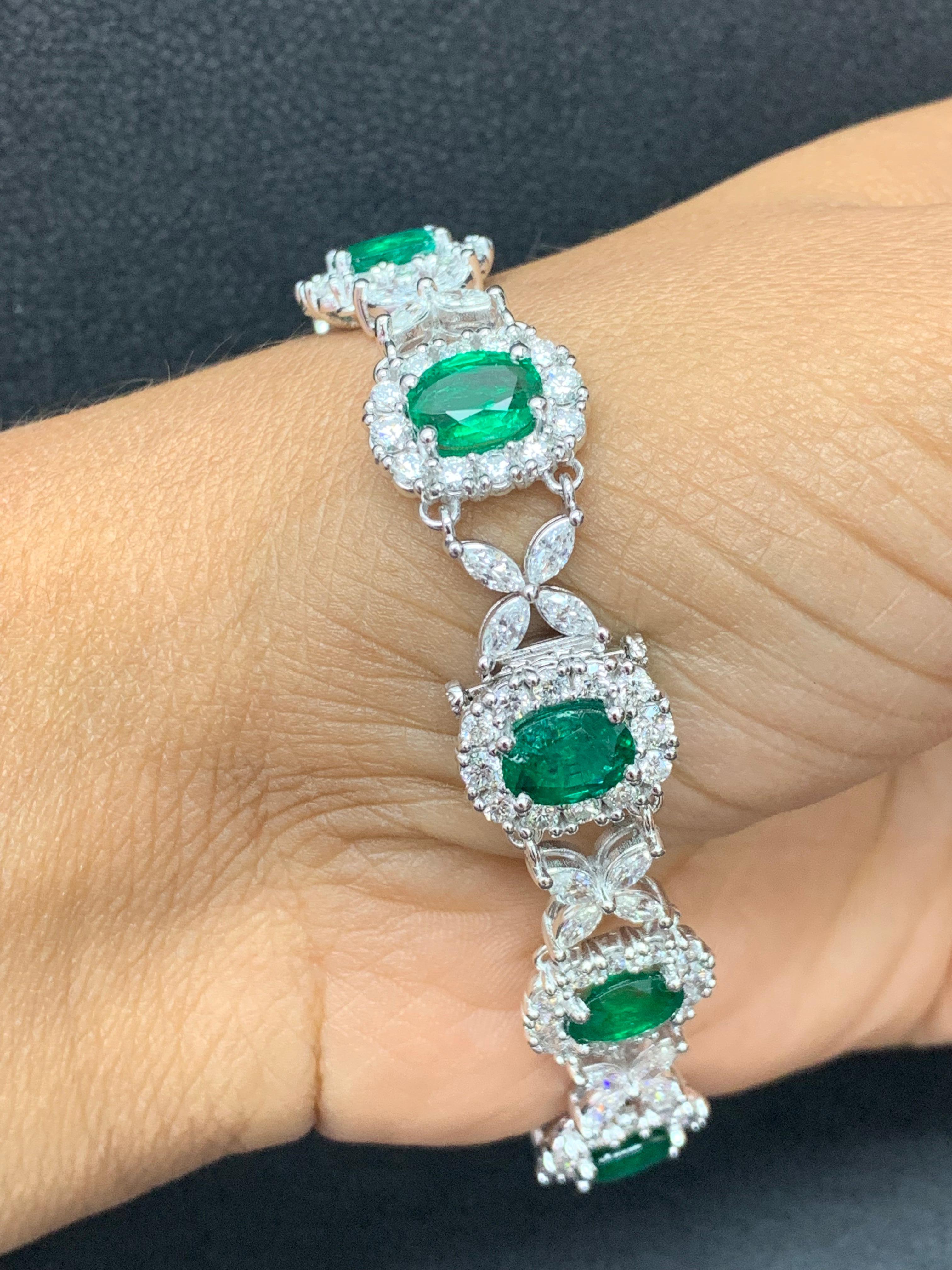 10.52 Carat Oval Cut Emerald and Diamond Tennis Bracelet in 14K White Gold For Sale 11
