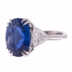10.52ct. Blue Sapphire AGL & Trillion Cut Diamond Platinum Three-Stone Ring
