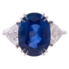 10.52ct. Blue Sapphire AGL & Trillion Cut Diamond Platinum Three-Stone Ring