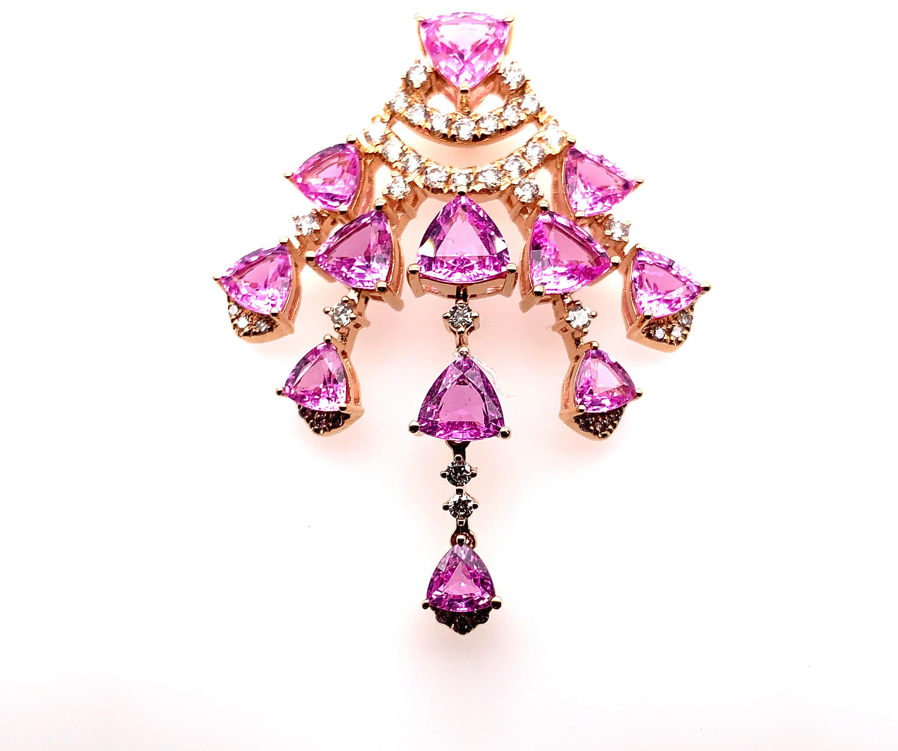 Sunita Nahata presents an exclusive collection of pink sapphire earrings. This particular earring showcases dangling sapphires and diamonds, and is constructed to fall elegantly on the wearer. 

Designer pink sapphire earring in 18K rose gold with