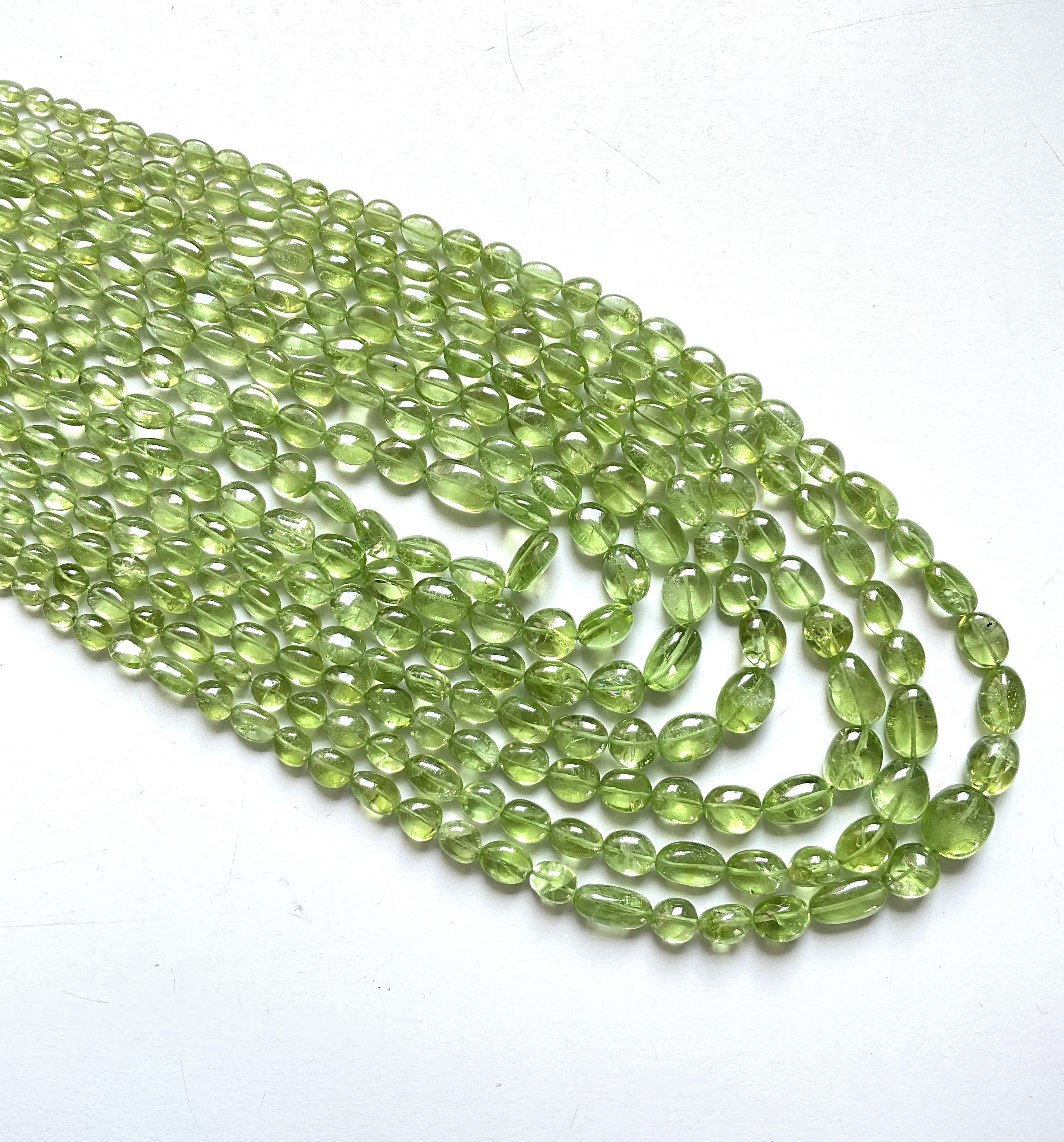 1055.55 carat apple green peridot top quality plain tumbled natural necklace gem For Sale 1