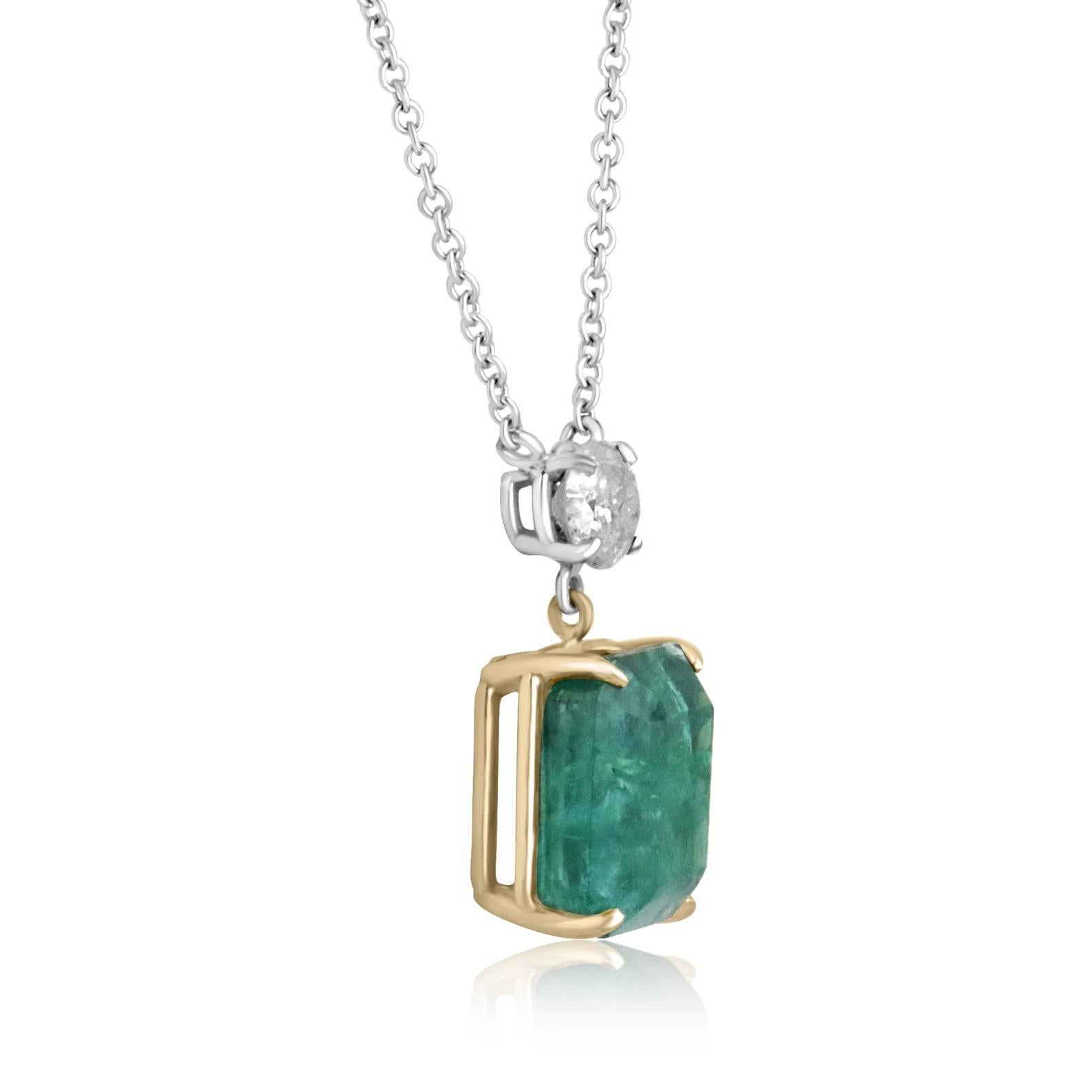 Take a look at this stunning emerald and diamond necklace. The natural, Zambian emerald carries a full 9.67-carats. The stone displays deep green color and incredible natural imperfections that will have you dazed in its mystic beauty. Accented at
