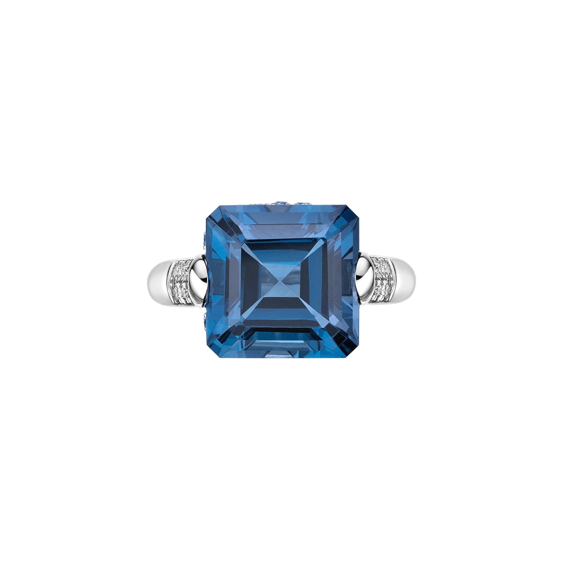 This is fancy London Blue Topaz Ring in Octagon shape purple hue. The Ring is elegant and can be worn for many occasions. The London Blue Topaz around the ring add to the beauty and elegance of the ring.
  
London Blue Topaz Fancy Ring in 18Karat