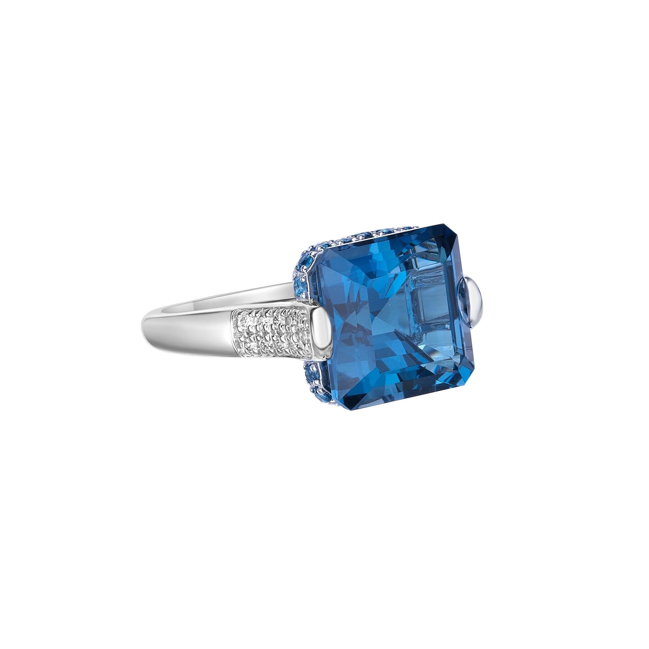 Contemporary 10.59 Carat London Blue Topaz Fancy Ring in 18KWG with White Diamond. For Sale