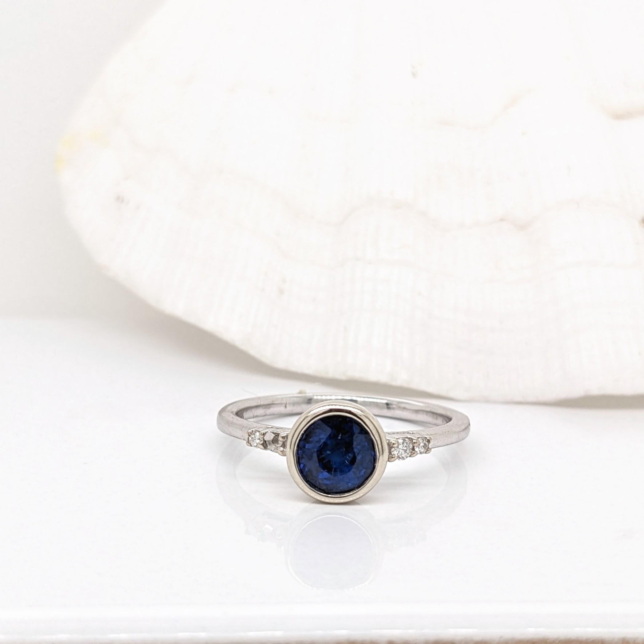 This adorable ring features a stunning deep blue Sapphire in 14k white Gold with diamond accents. This classic ring makes for a stunning accessory to any look!

Specifications:

Item Type: Ring
Center Stone: Sapphire
Treatment: Diffused
Weight: