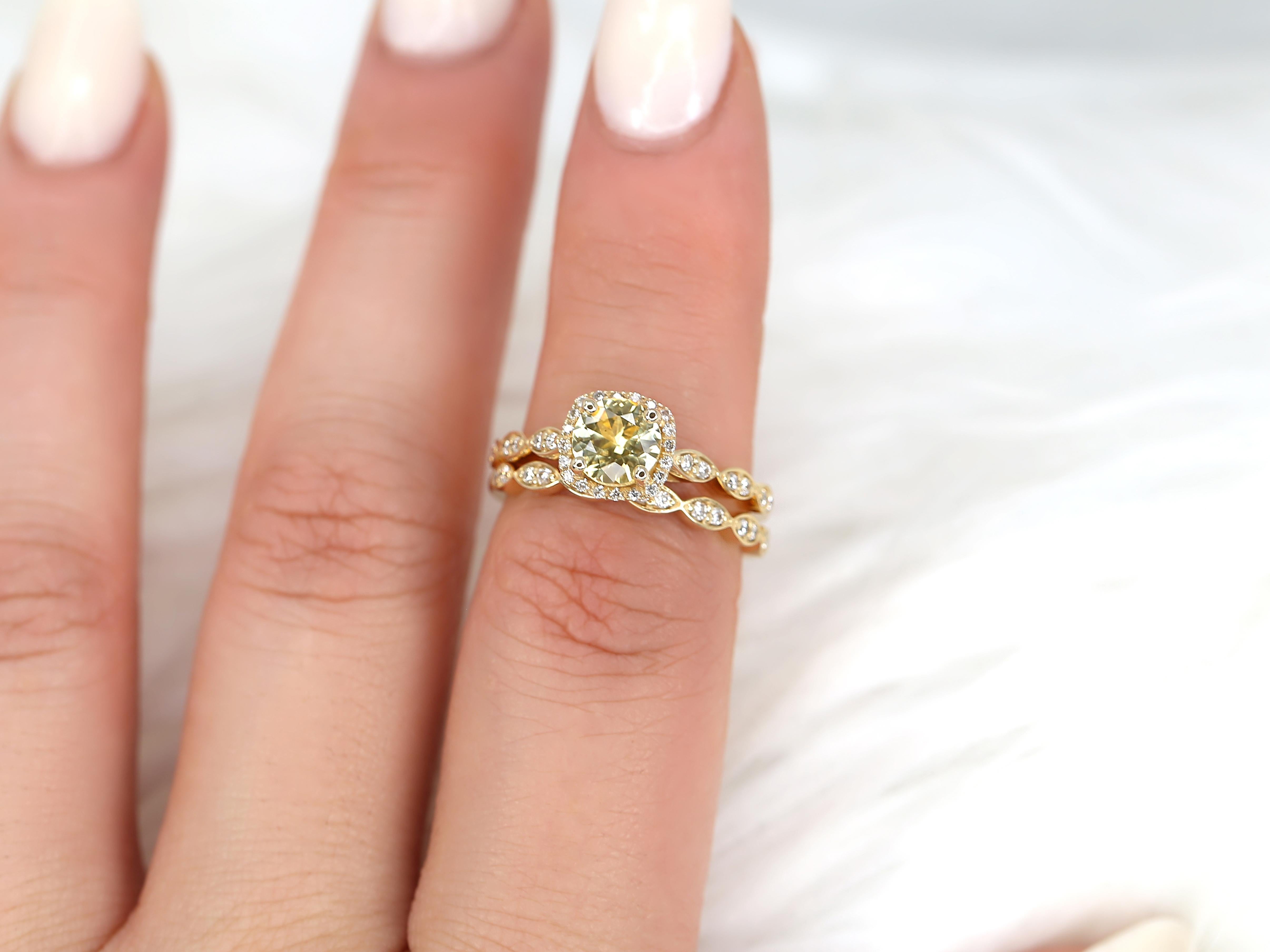 Zesty bright lemons is the color that best describes the unique yellow sapphire color. Mounted in our classic Christie, this one of a kind bridal set is perfection for the yellow super fan!

Detail of Ring(s):



(Engagement Ring 1/2)

Center Stone