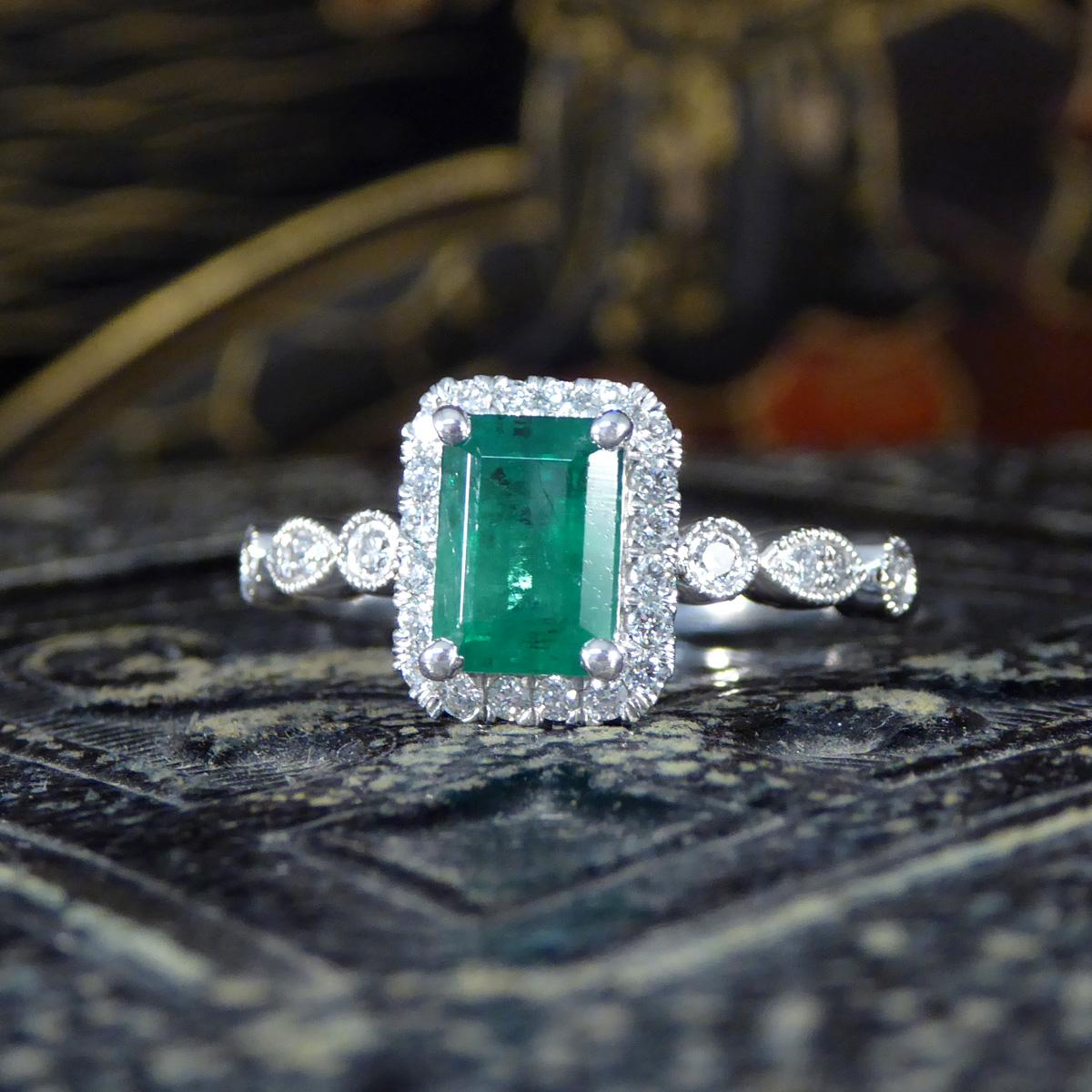 1.05ct Emerald and Diamond Cluster Ring with Diamond Shoulders in Platinum For Sale 1