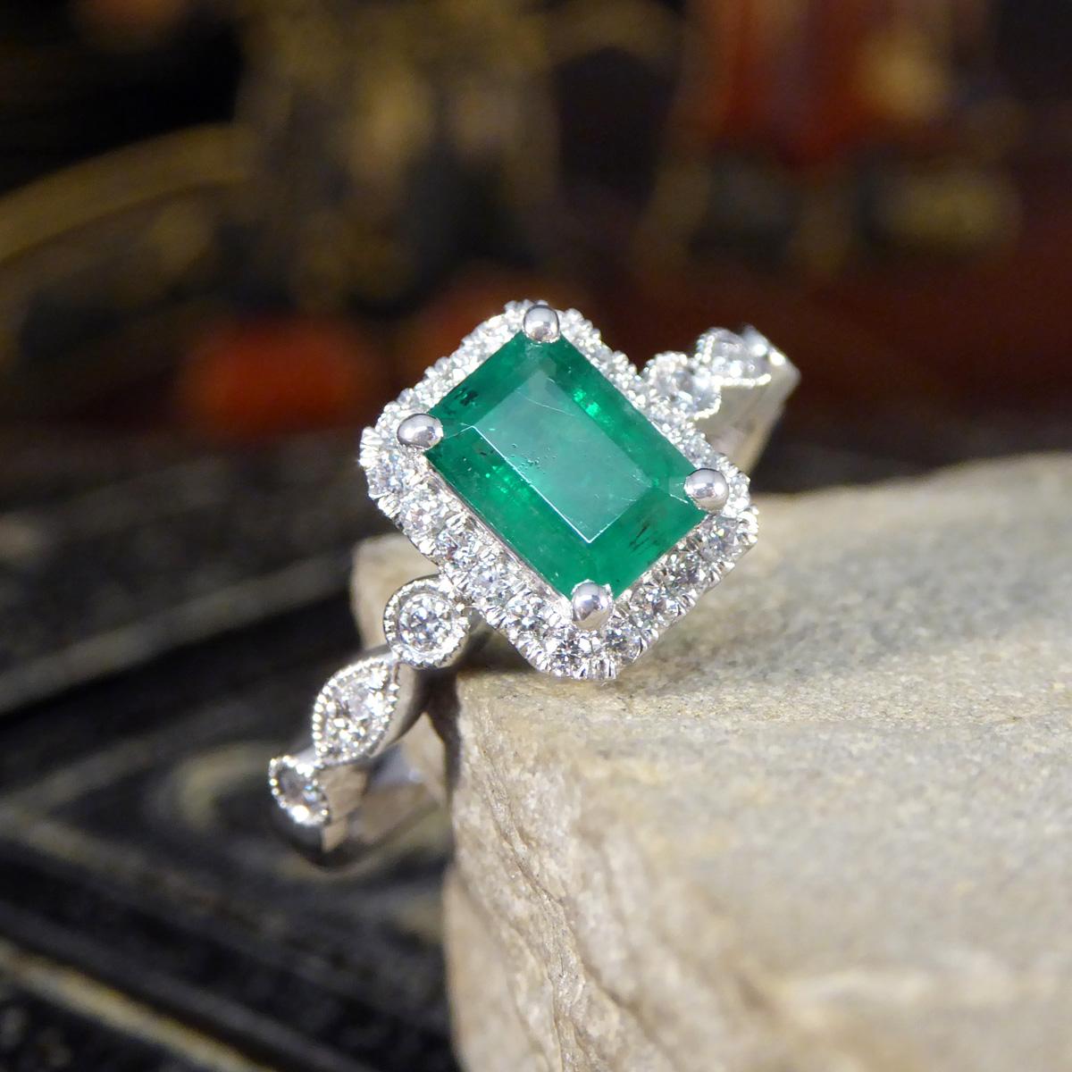 1.05ct Emerald and Diamond Cluster Ring with Diamond Shoulders in Platinum For Sale 3
