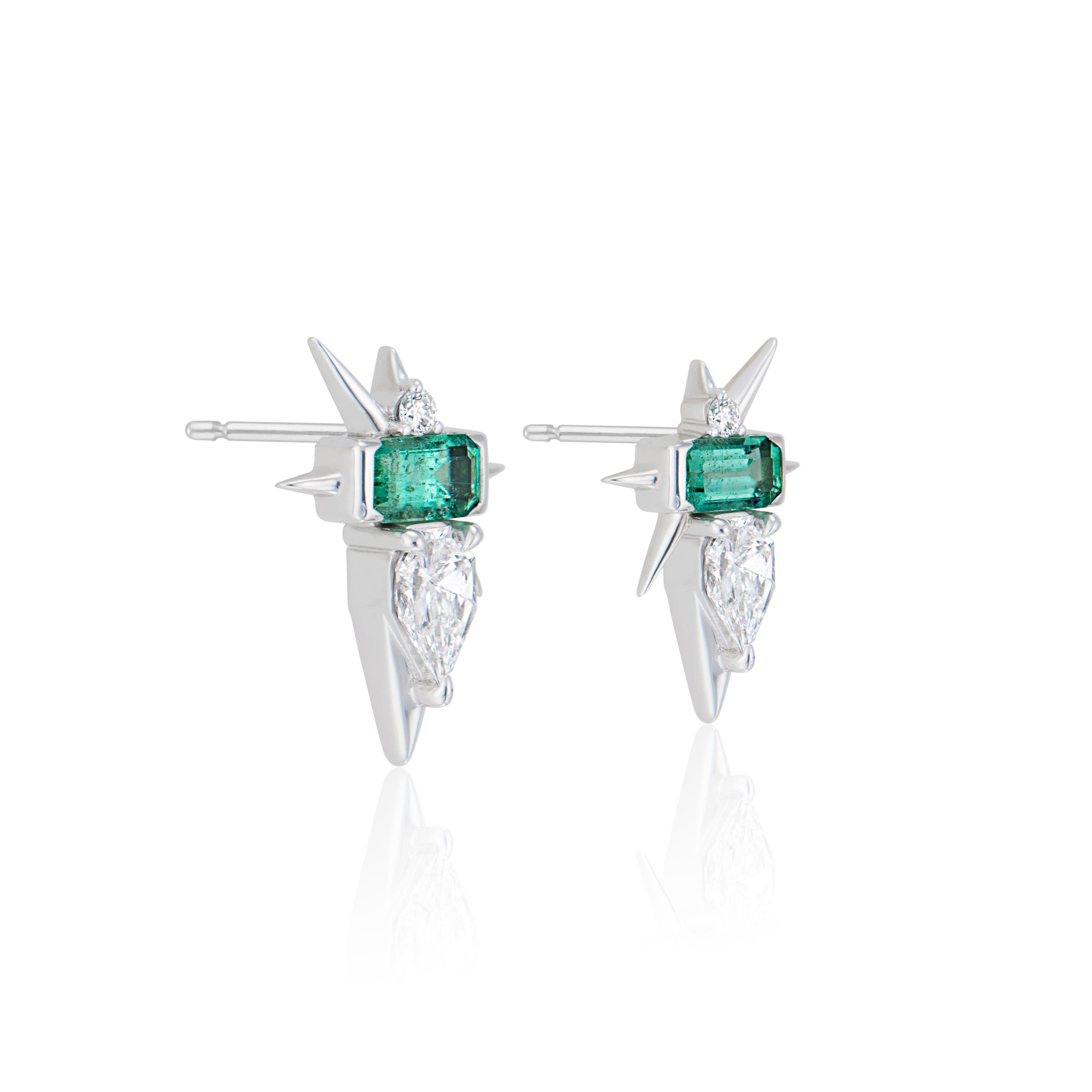 Emerald & Diamond Spike Earrings in 14k White Gold

- 2x Modified step cut pear-shaped diamonds F-VS 0.51ct
- 2 x emerald cut emeralds (0.50ct)
- 2 x round brilliant cut diamonds F-VS 0.04ct
- Approx weight in 14ct white gold 3gms
- Push-Back
-