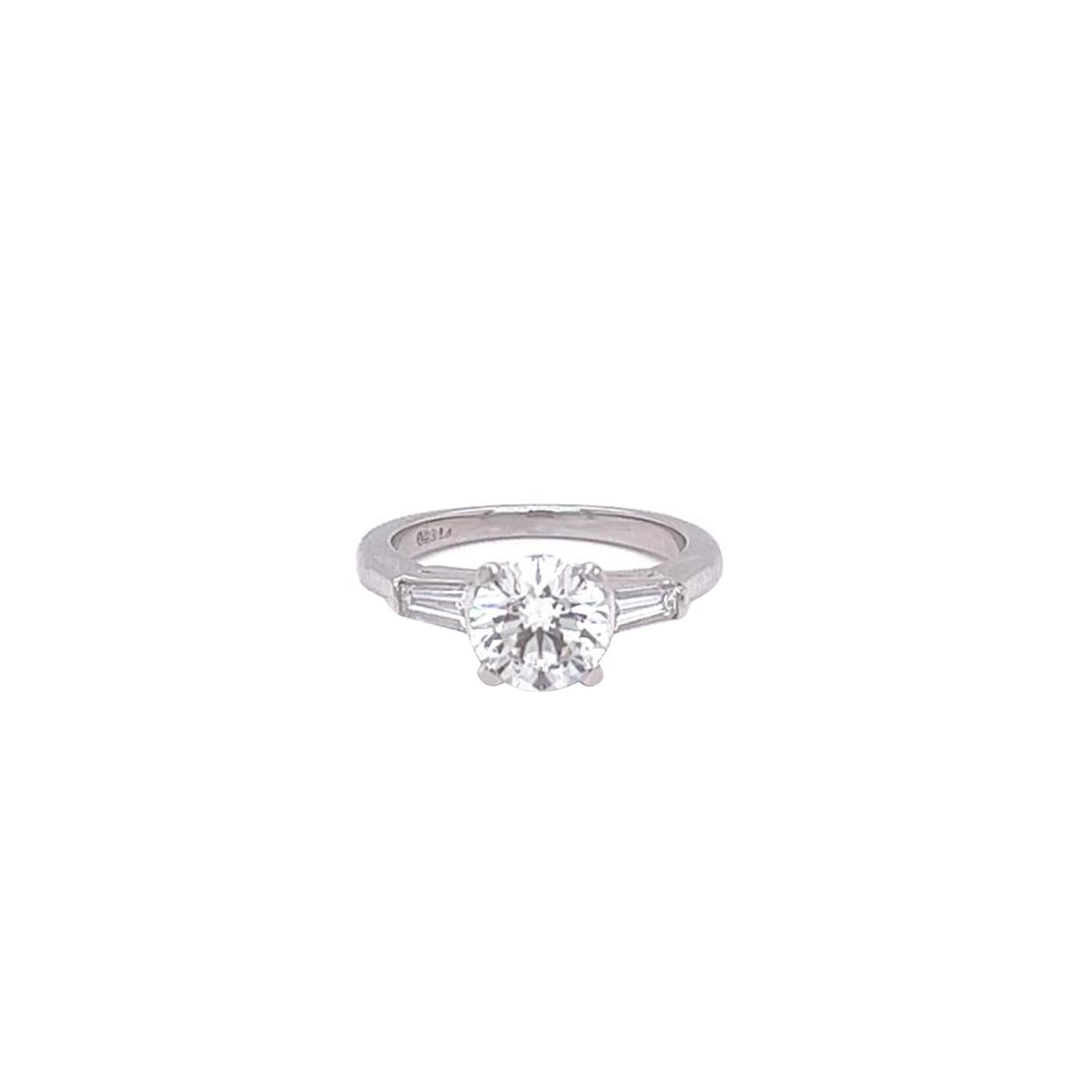Inspired by one of the world’s most iconic styles, This Natural Round Engagement Ring is a true design masterpiece. Flawlessly created, This diamond ring is a timeless symbol of enduring beauty, destined to be treasured for generations to come. This