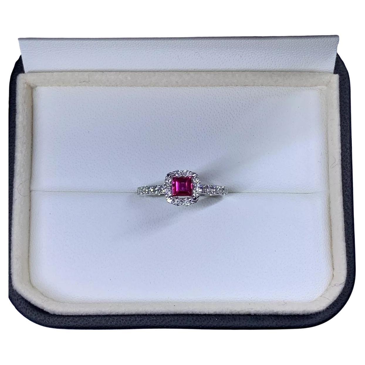 1.05ct Ruby and diamond engagement ring in 18k white gold.
