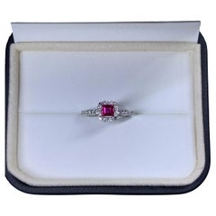 1.05ct Ruby and diamond engagement ring in 18k white gold.