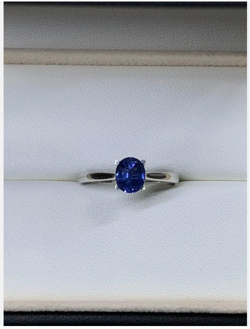 1.05ct Sapphire Royal Blue Solitaire Engagement Ring In 18ct White Gold
This stunning engagement ring features a 1.05ct natural oval-shaped sapphire in a beautiful royal blue colour, set in 18ct white gold. The solitaire setting style showcases the