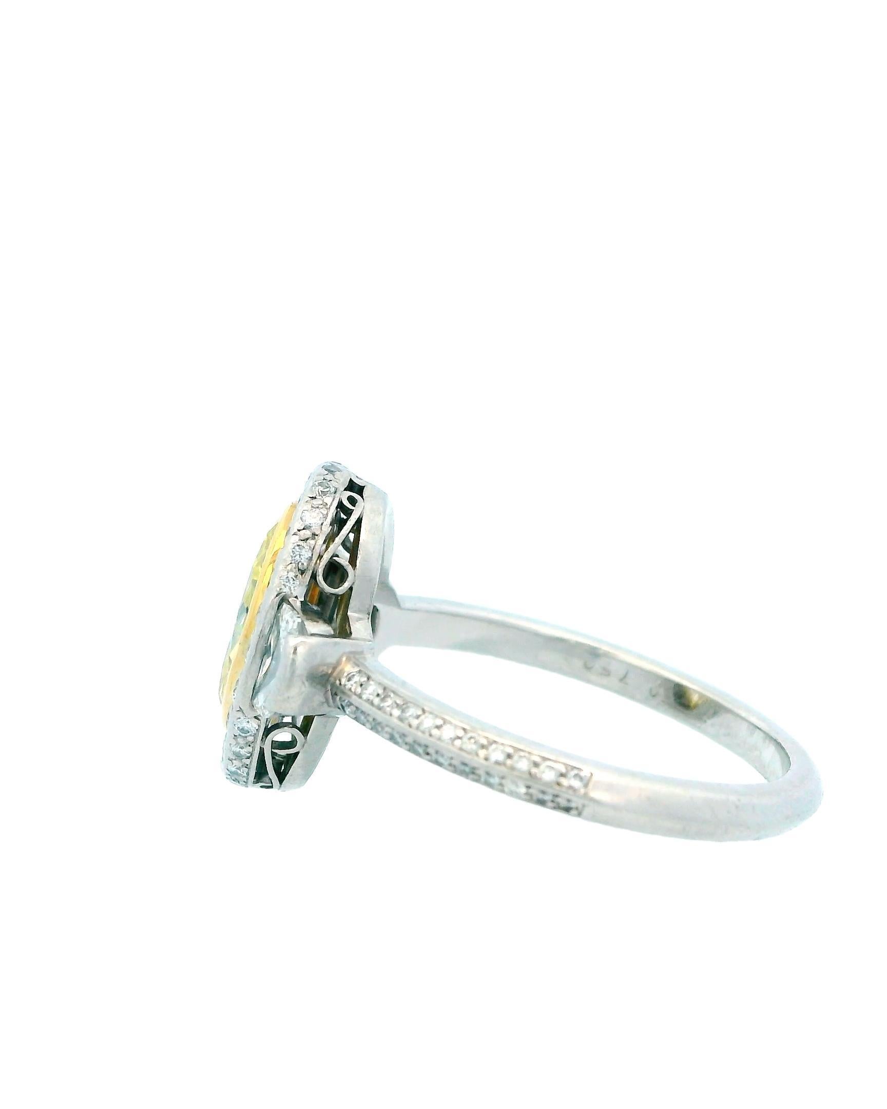 Radiant Elegance and Sophistication.

Set with a Marquise-Cut Yellow Diamond(chip on the table)

Encircled by Mixed-Cut White Diamonds.

Gold Setting.

21st Century.

Size - 8.75.