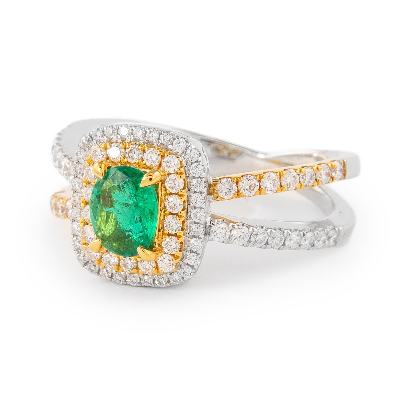 Beautiful emerald and diamond halo ring.
1.05 carats total gemstone weight.
0.49 carat oval shape emerald, approximately F2. Complimented by 82 round brilliant diamonds, 0.56 carats, F/G color and VS clarity. 14k white and yellow gold, 5.87 grams,