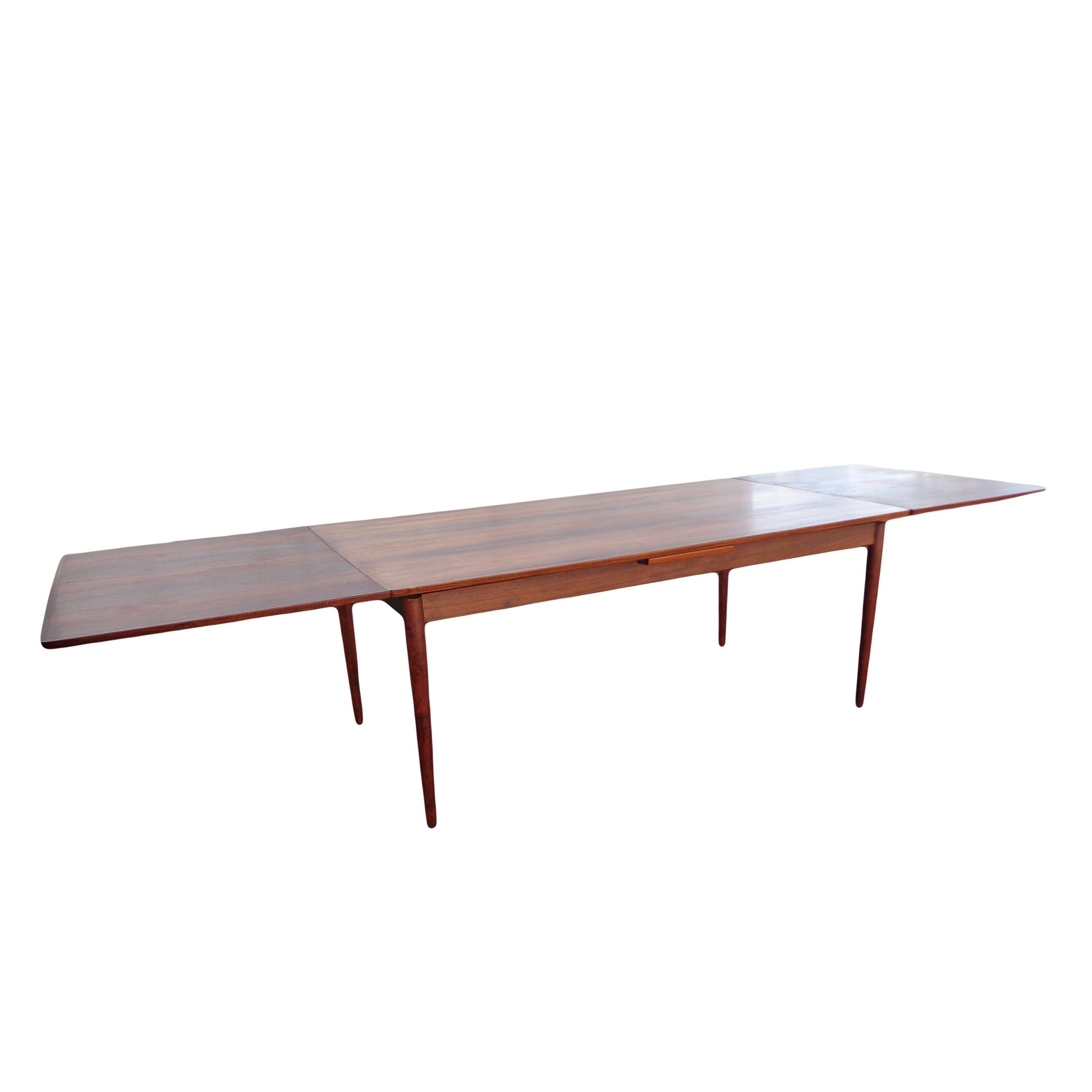 Danish 1960’s Niels Møller rosewood dining table
Model 254

Large Danish midcentury dining table designed by Niels O. Møller for J.L Møllers Møbelfabrik, Rich rosewood top with tapered legs..

Measures: Expands from 71