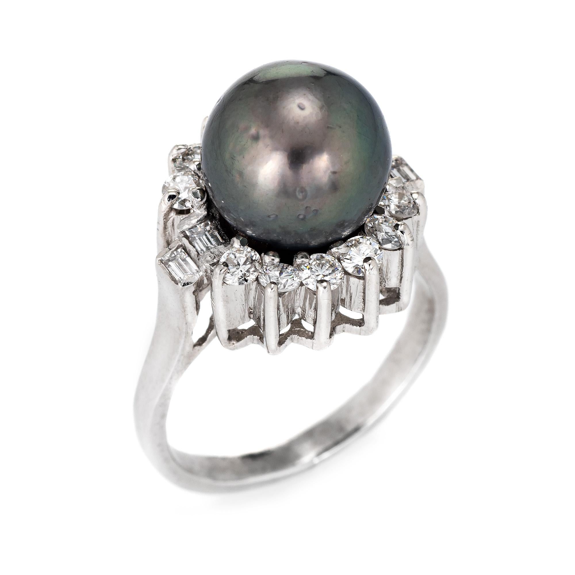 Stylish estate 10.5mm black Tahitian South Sea pearl & diamond cocktail ring crafted in platinum. 

10.5mm black cultured Tahitian South Sea pearl is accented with an estimated 0.60 carats of mixed cut diamonds (estimated at H-I color and VS2-SI1