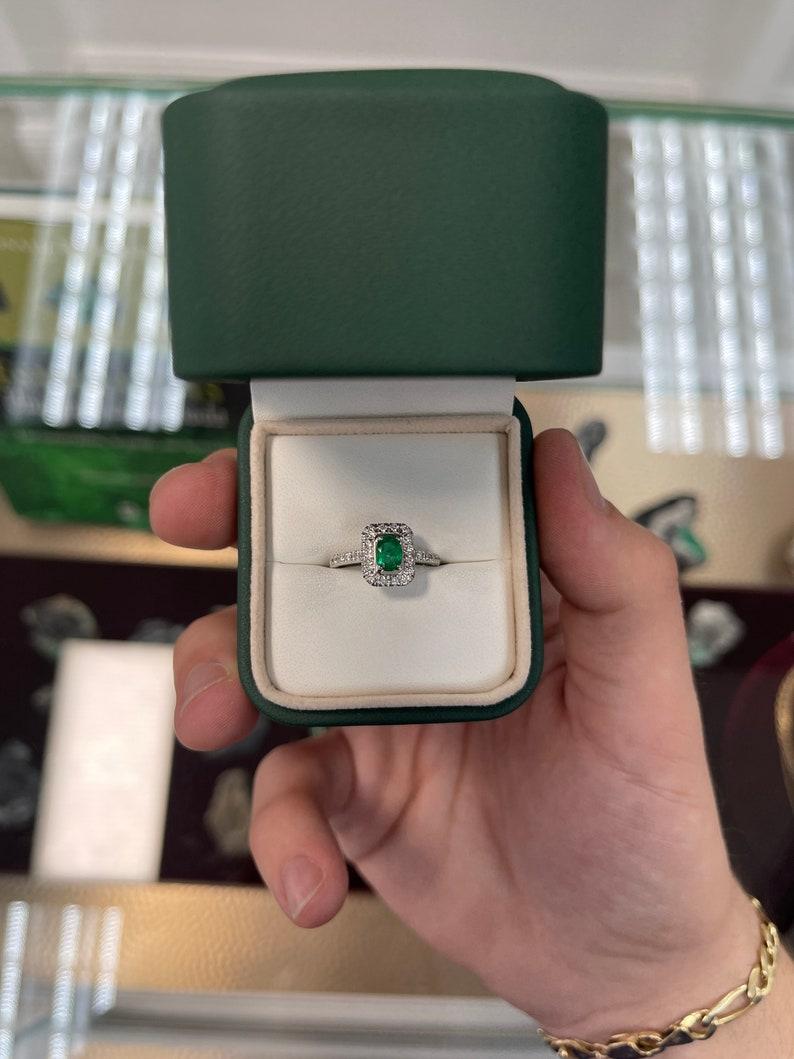 1.05tcw 18K Emerald Oval Cut & Diamond Halo and Shank Engagement Ring For Sale 1